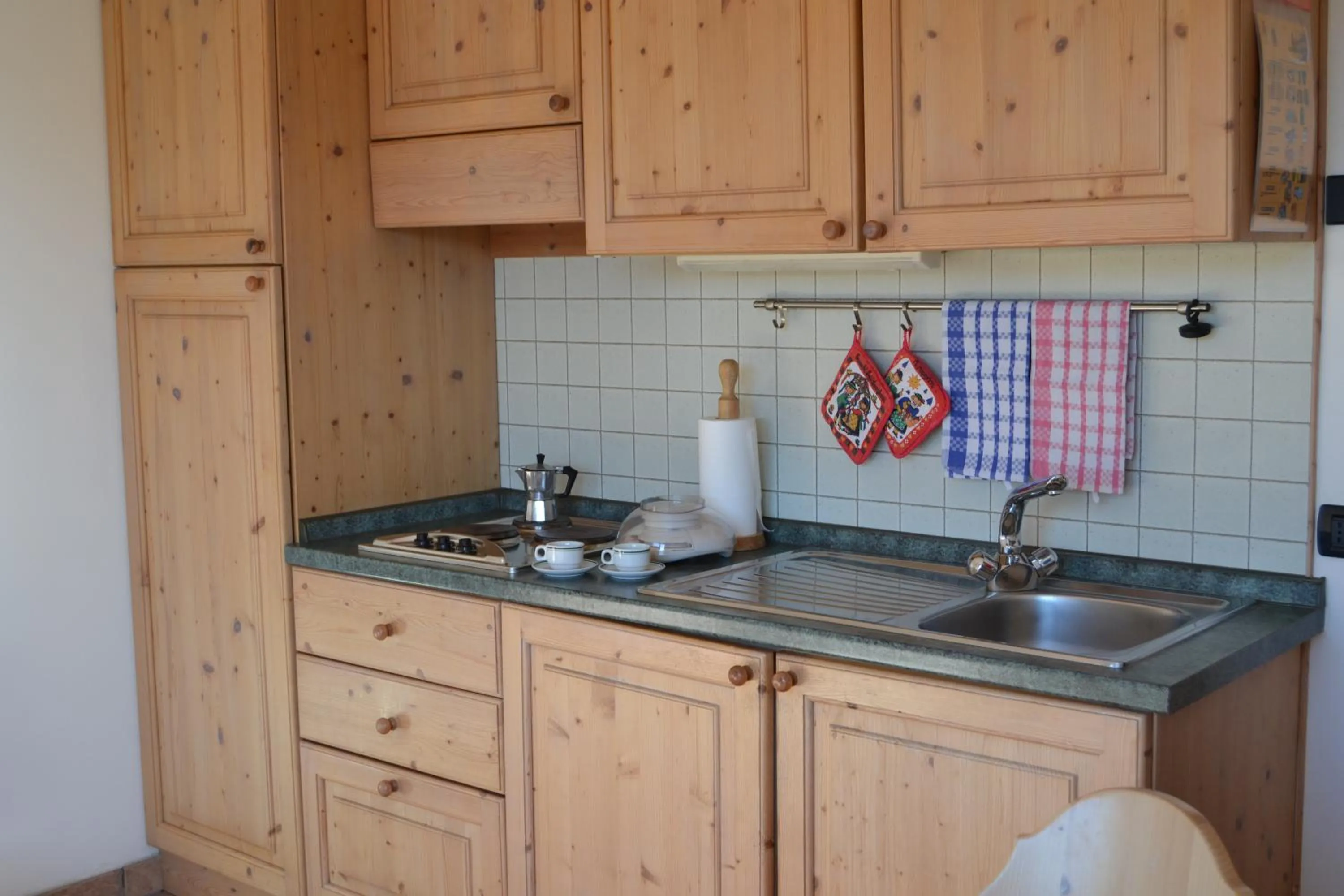 Kitchen or kitchenette in Giongo Residence - Appartamenti