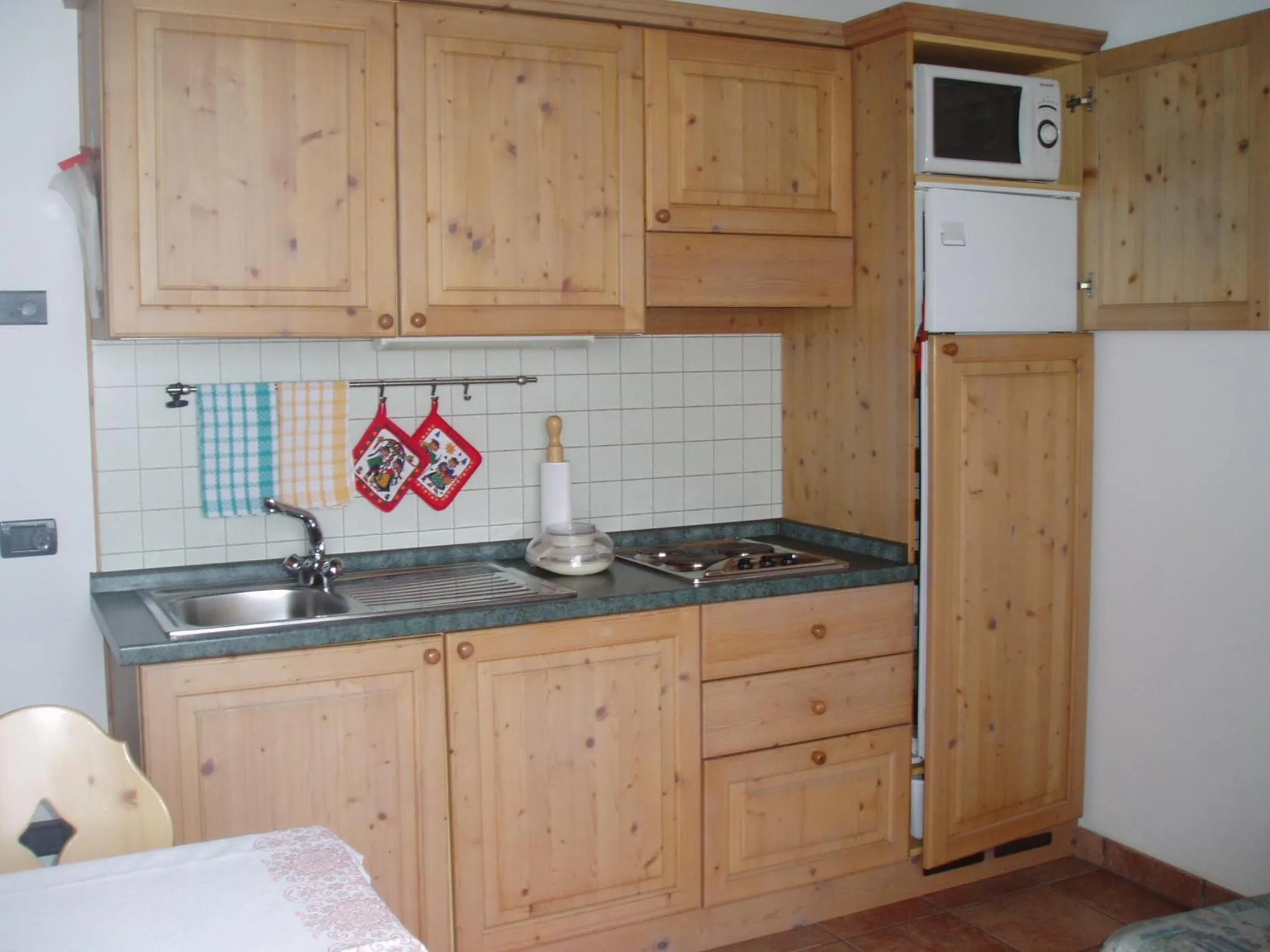 Kitchen or kitchenette in Giongo Residence - Appartamenti
