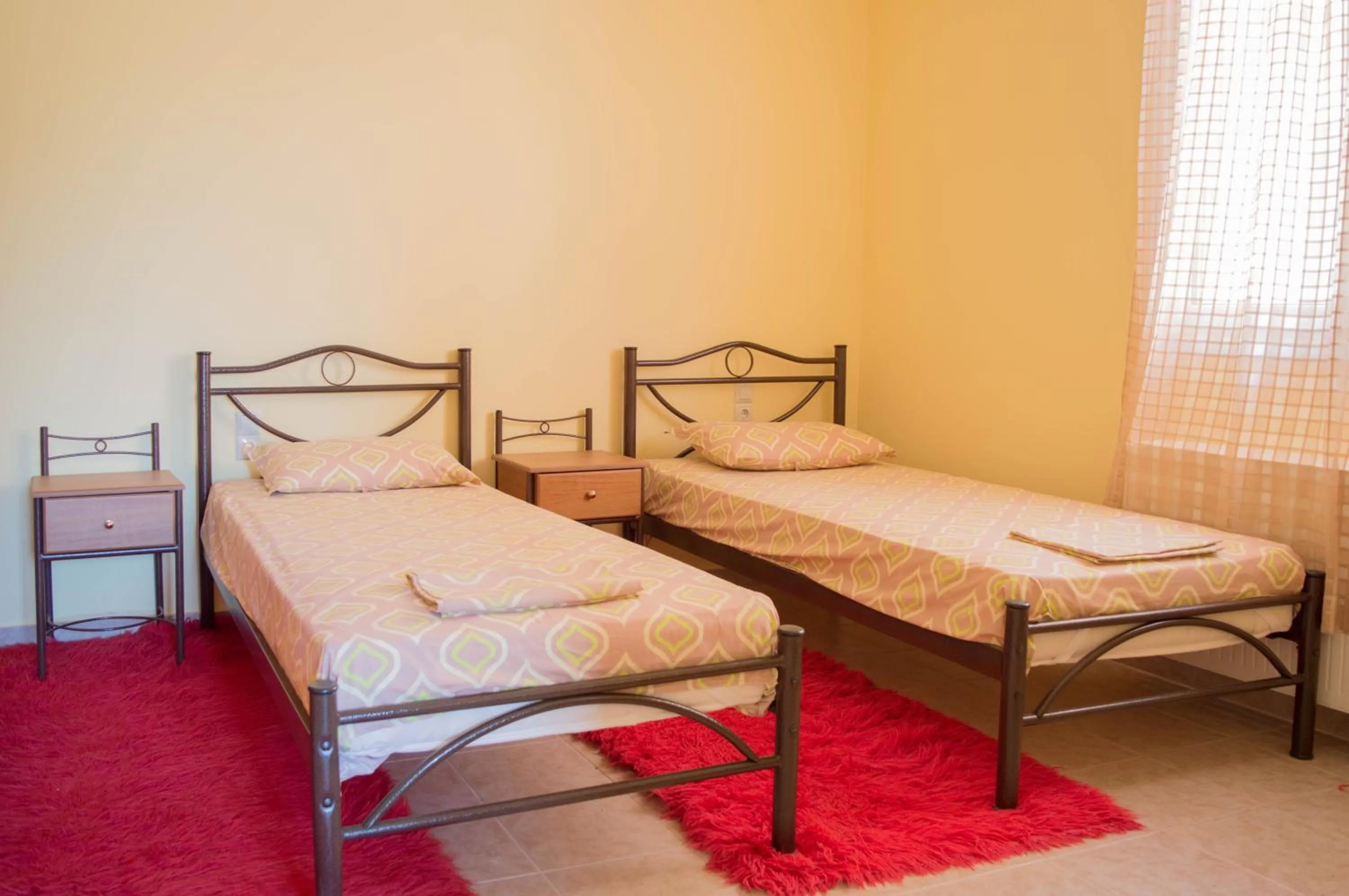 Bed in Manesi Apartments