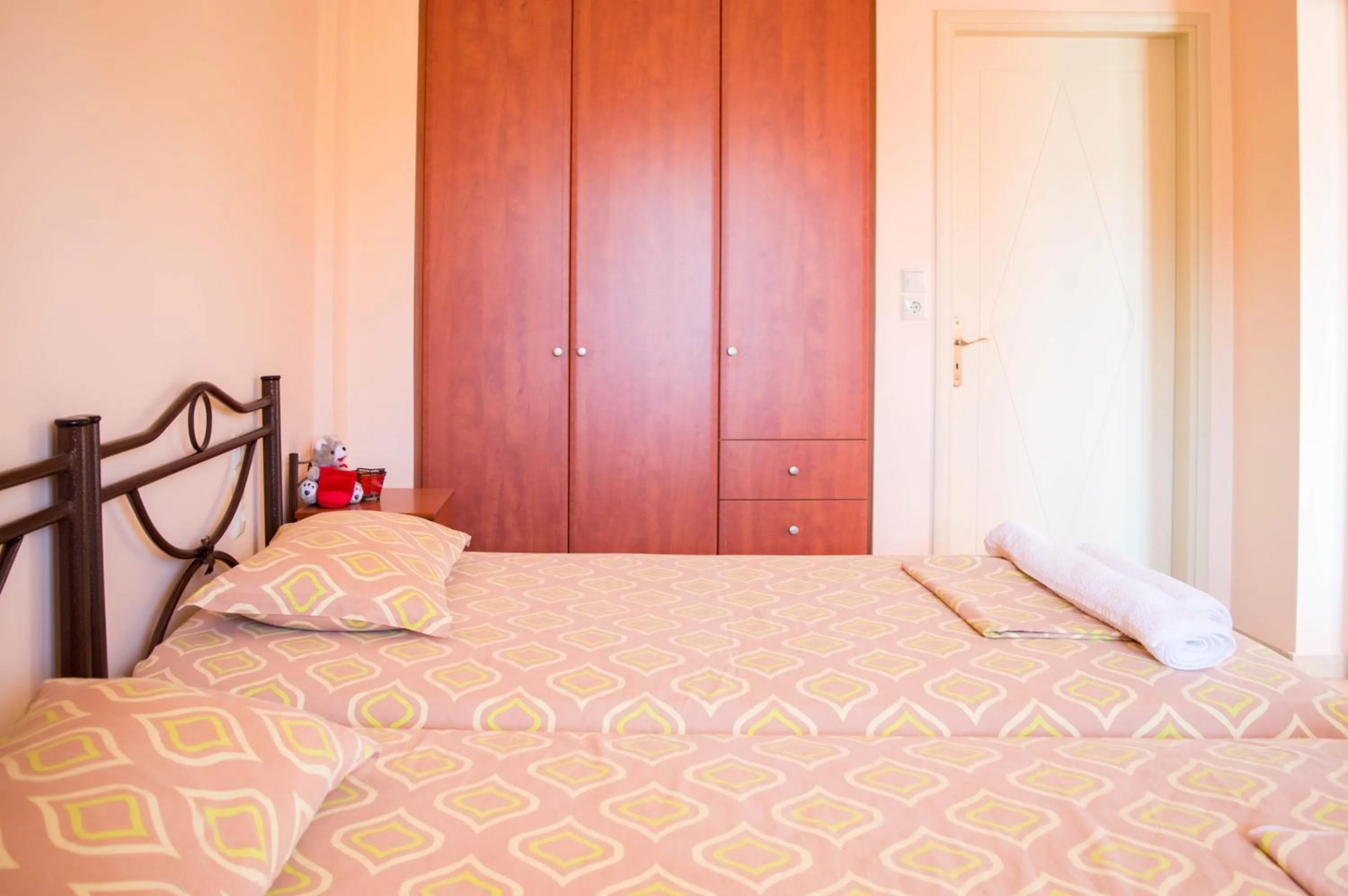 Bed in Manesi Apartments