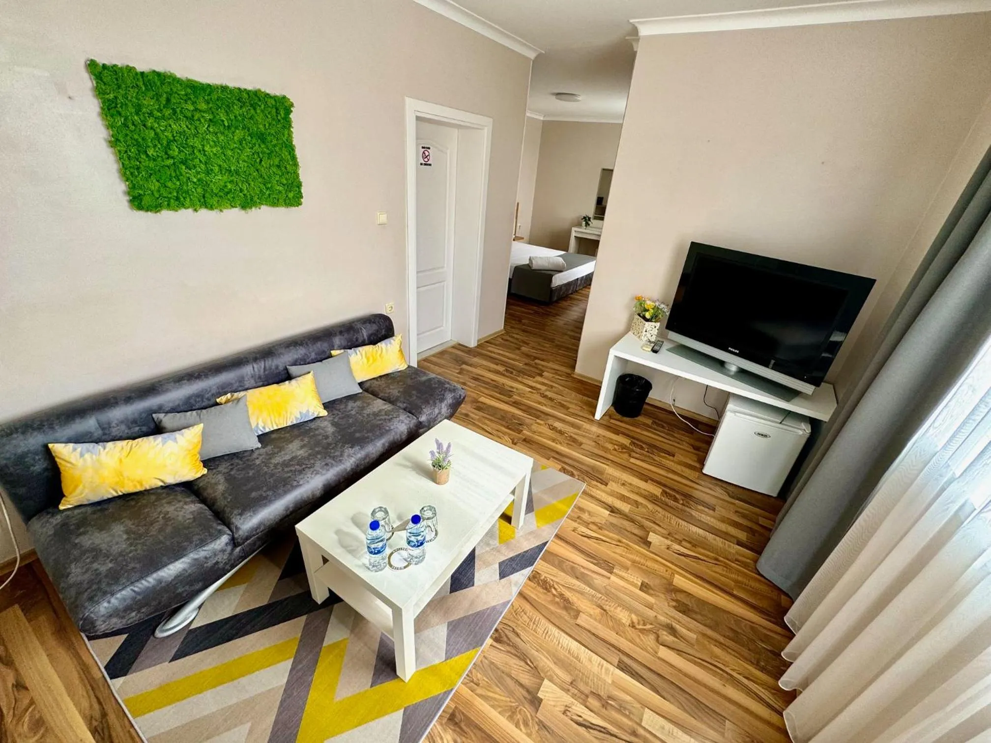 Communal lounge/ TV room in Hotel Amfora