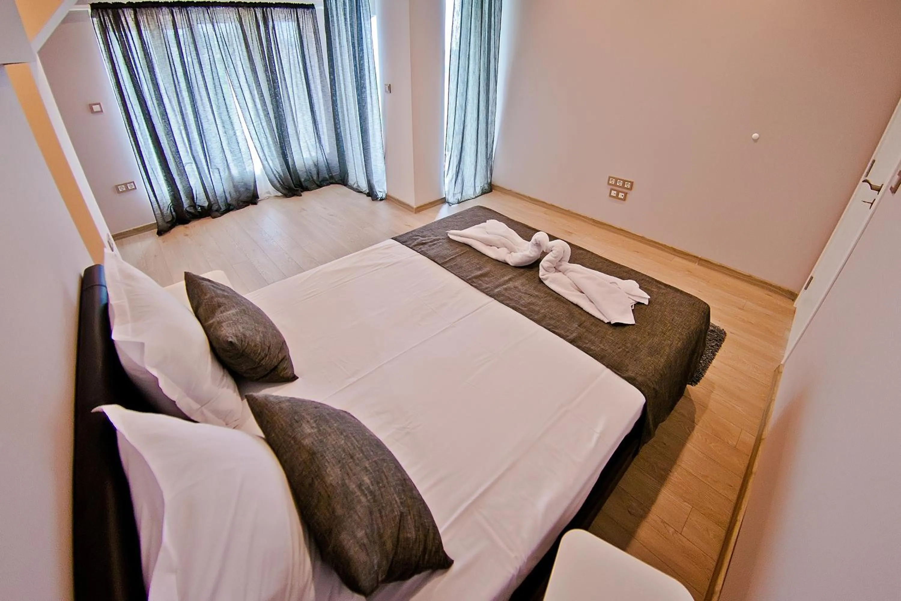 Bed in Hotel Amfora