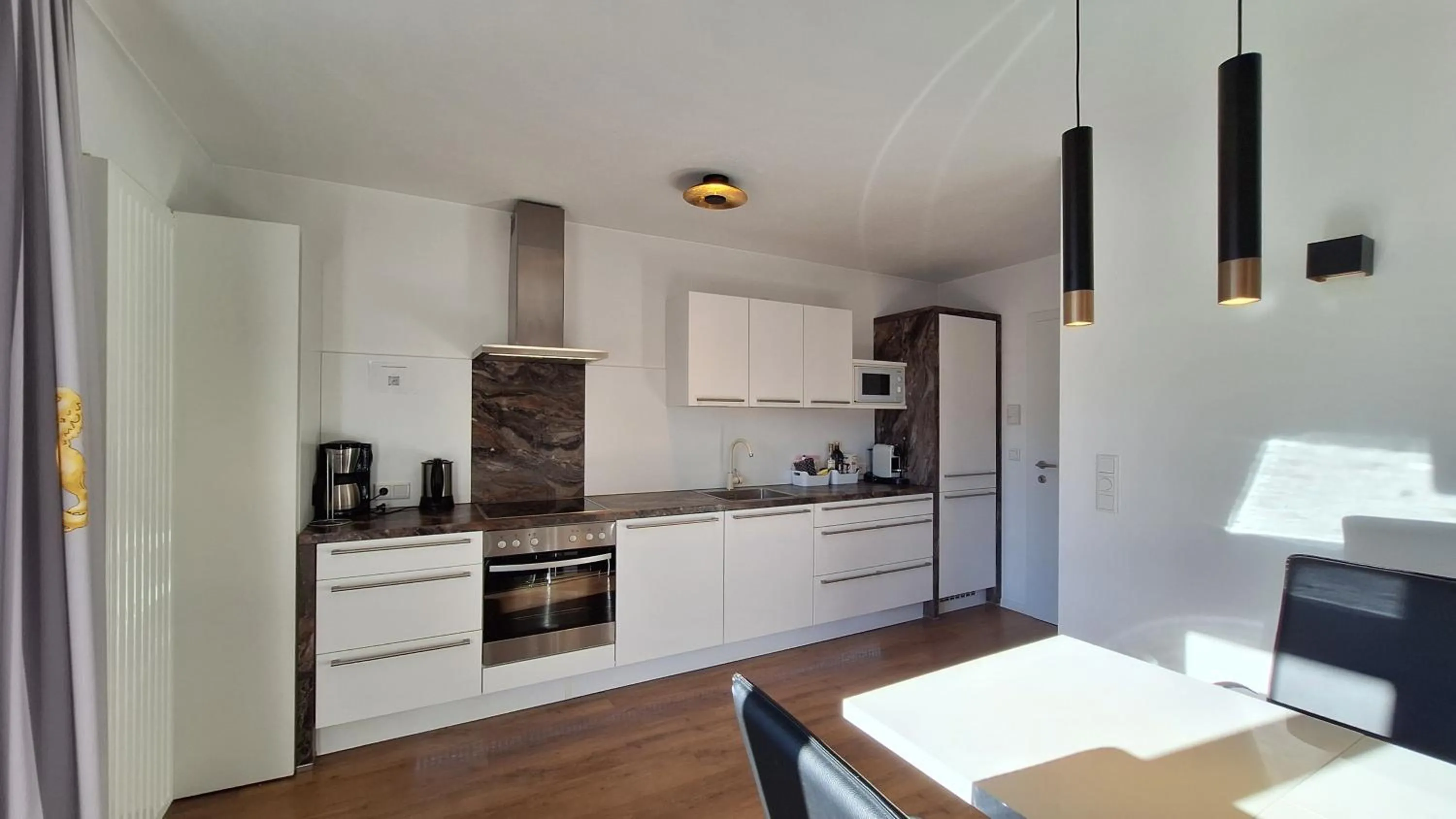Kitchen or kitchenette in Panorama Apartments - Steinbock Lodges