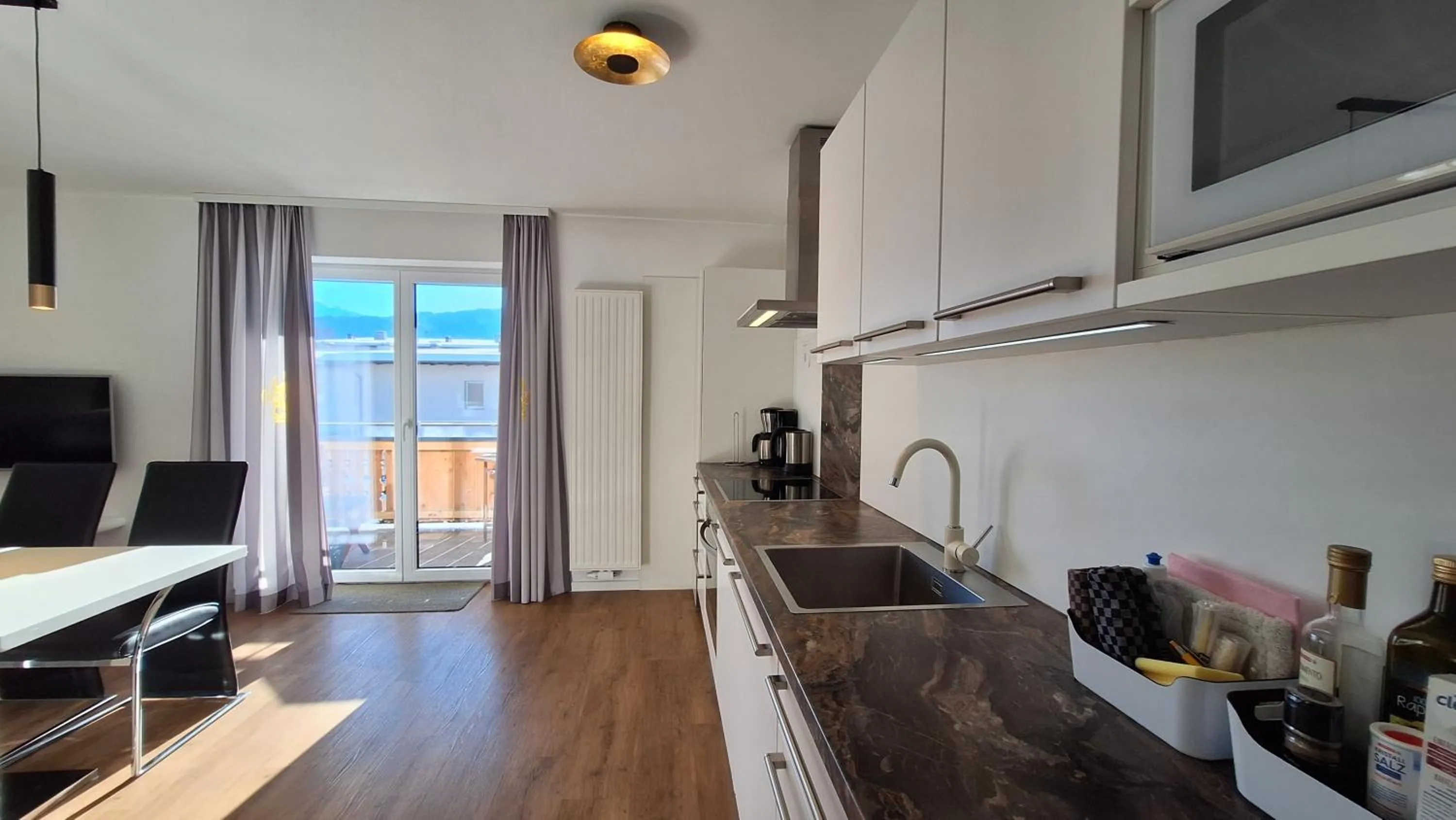 Kitchen or kitchenette in Panorama Apartments - Steinbock Lodges