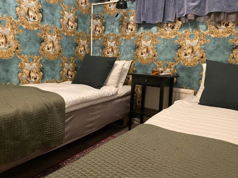 Bed in Hotel Tre Små Rum