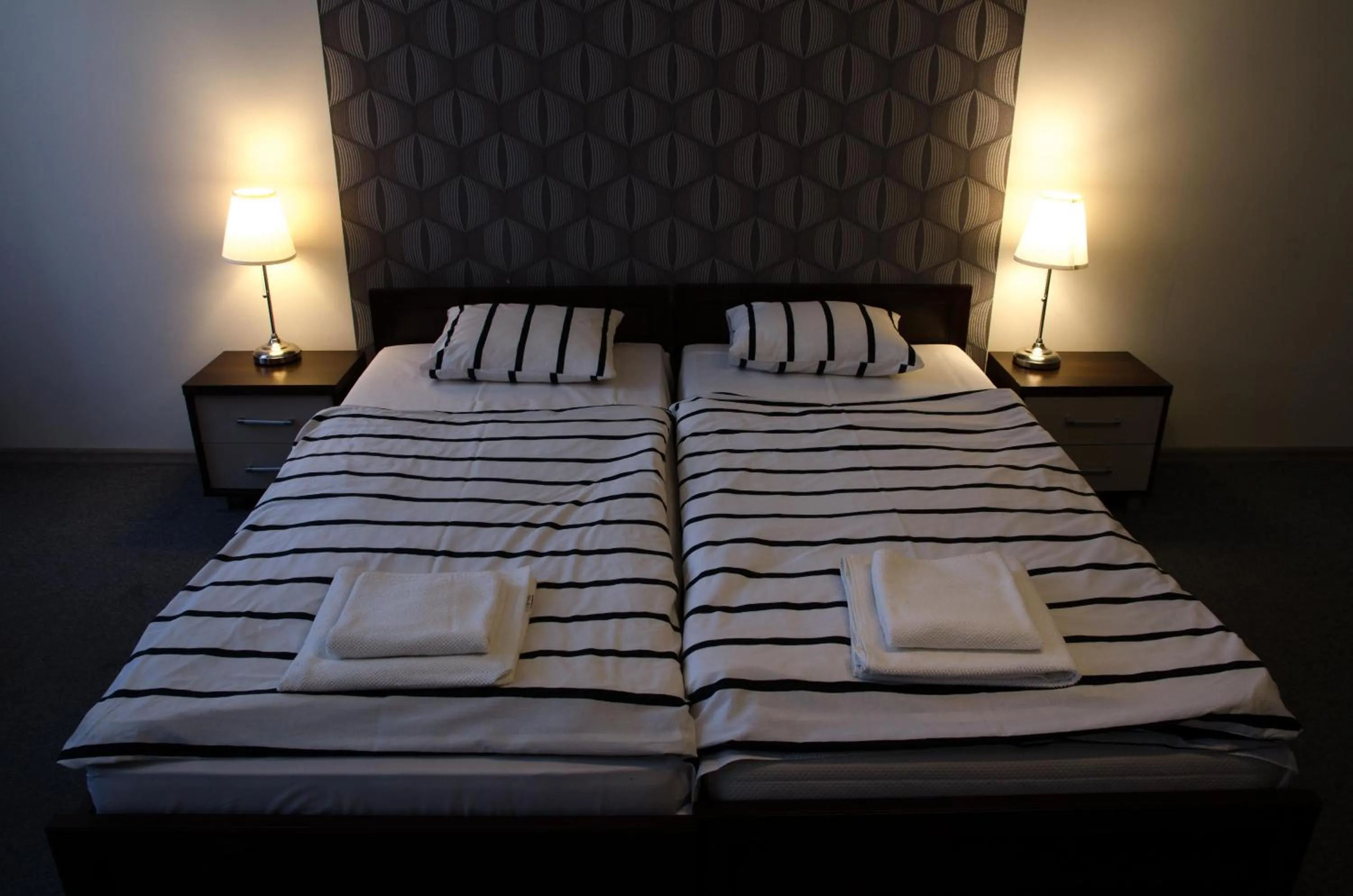 Bed in Brama Old City Rooms