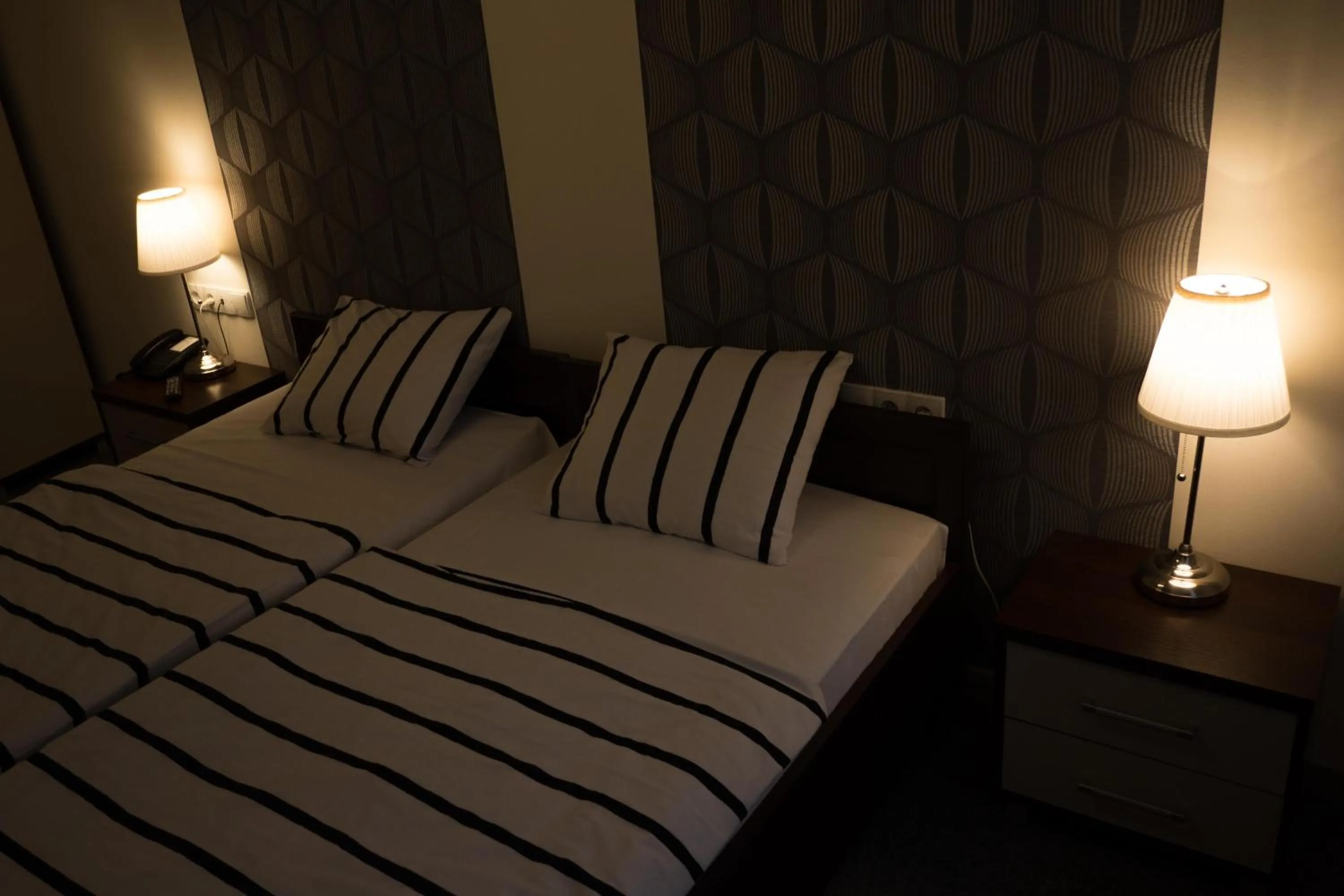 Bed in Brama Old City Rooms