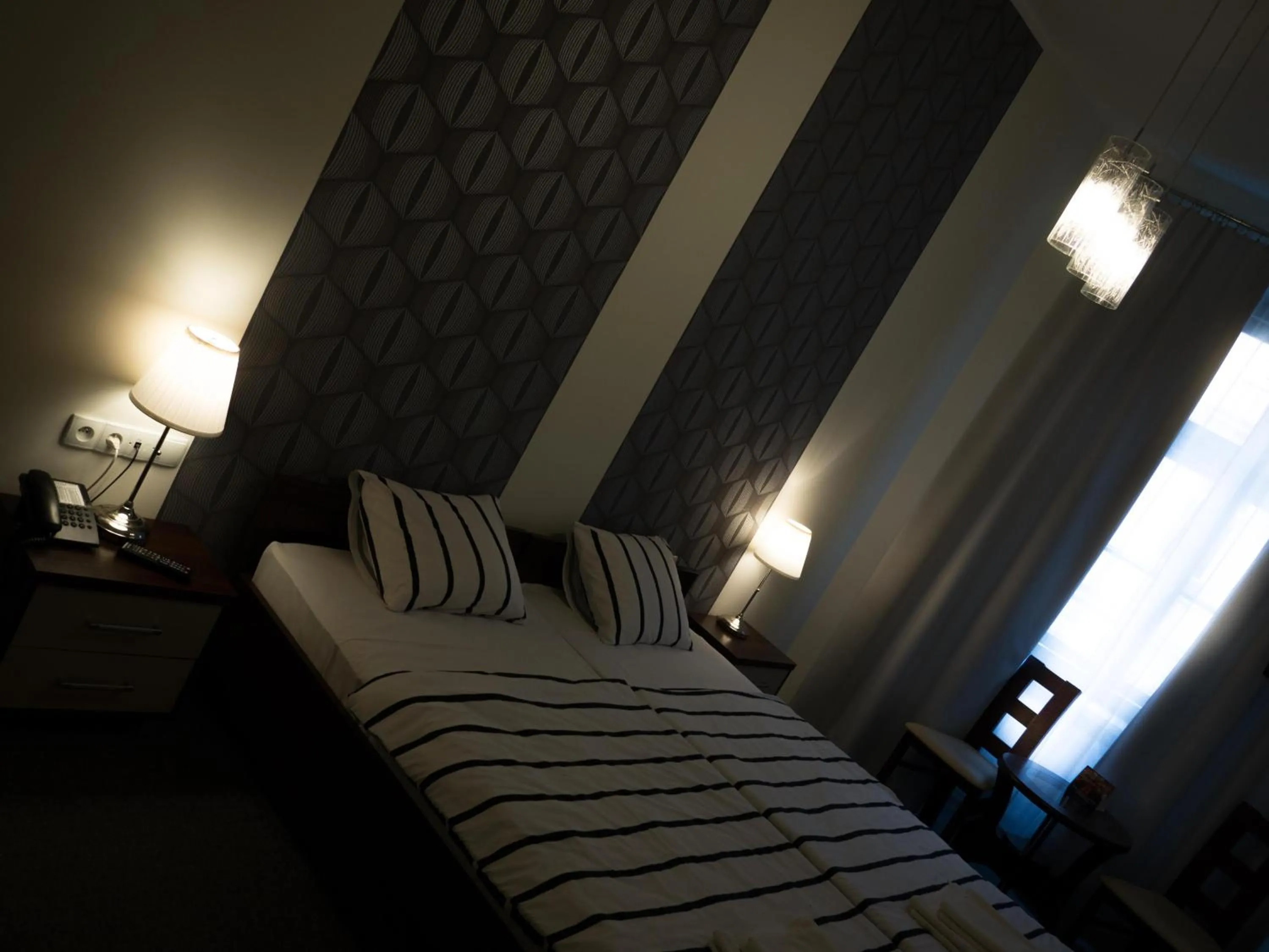 Bed in Brama Old City Rooms