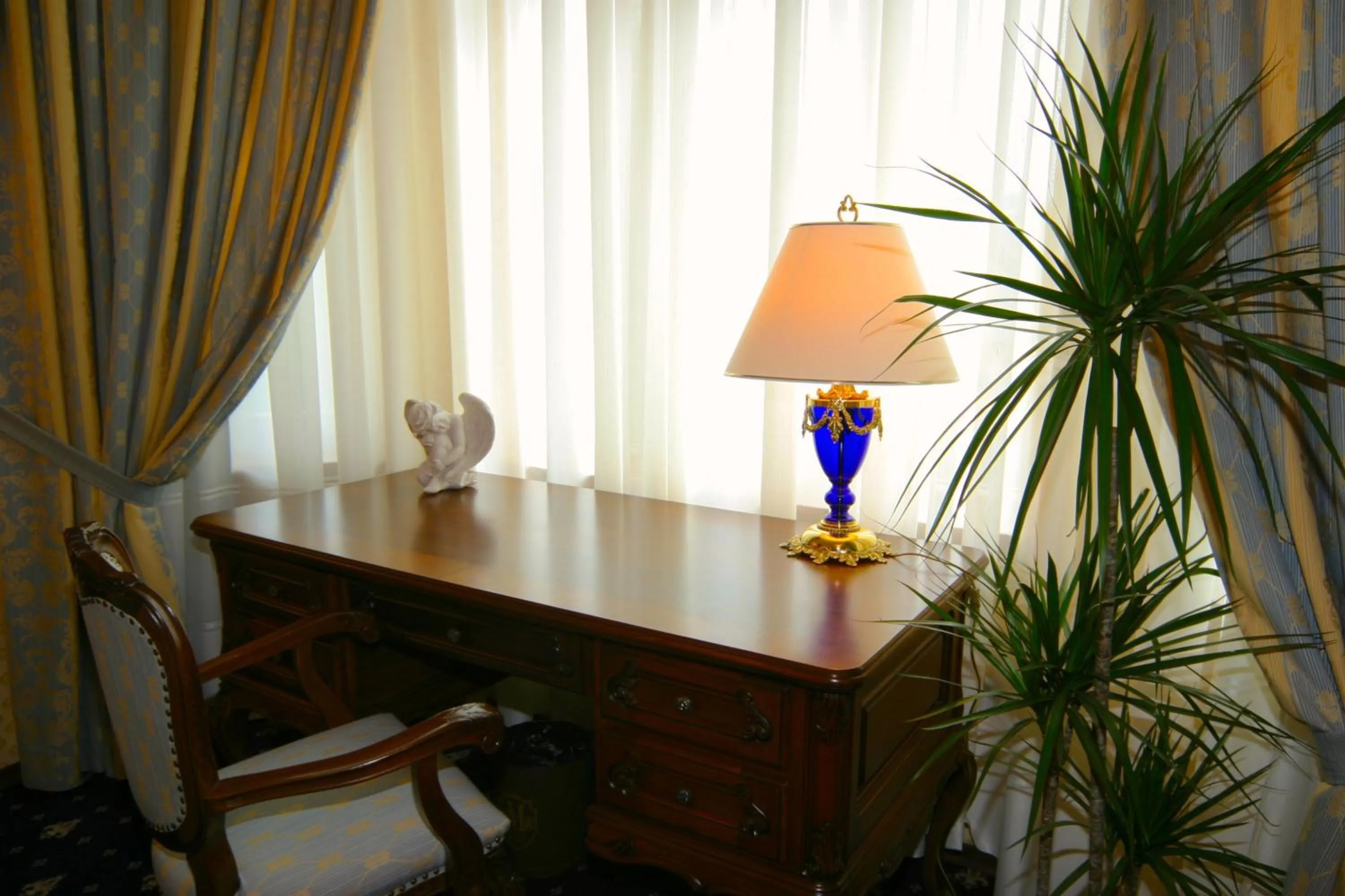 Bedroom in Grand Hotel London