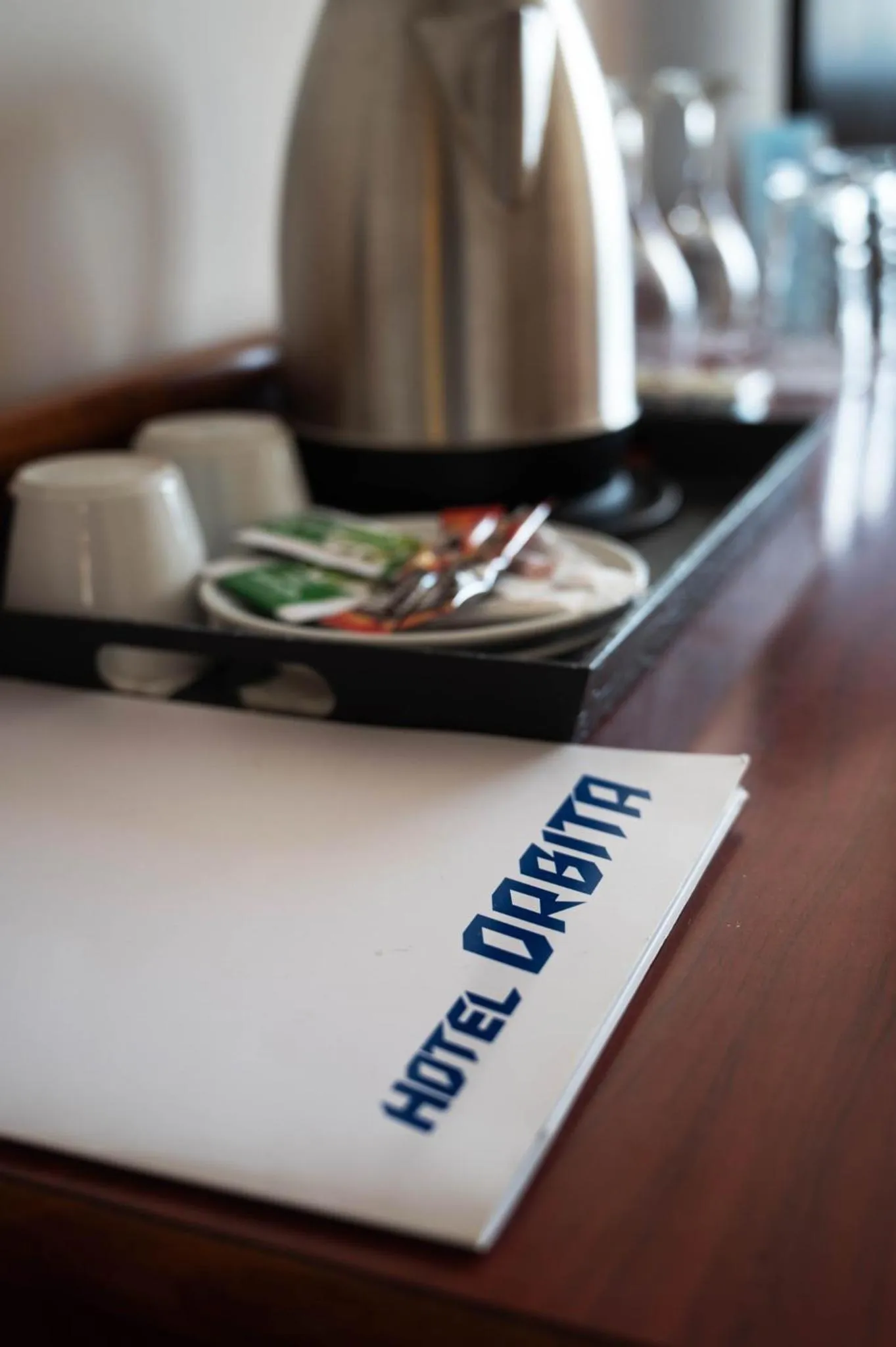 Property logo or sign in Hotel Orbita