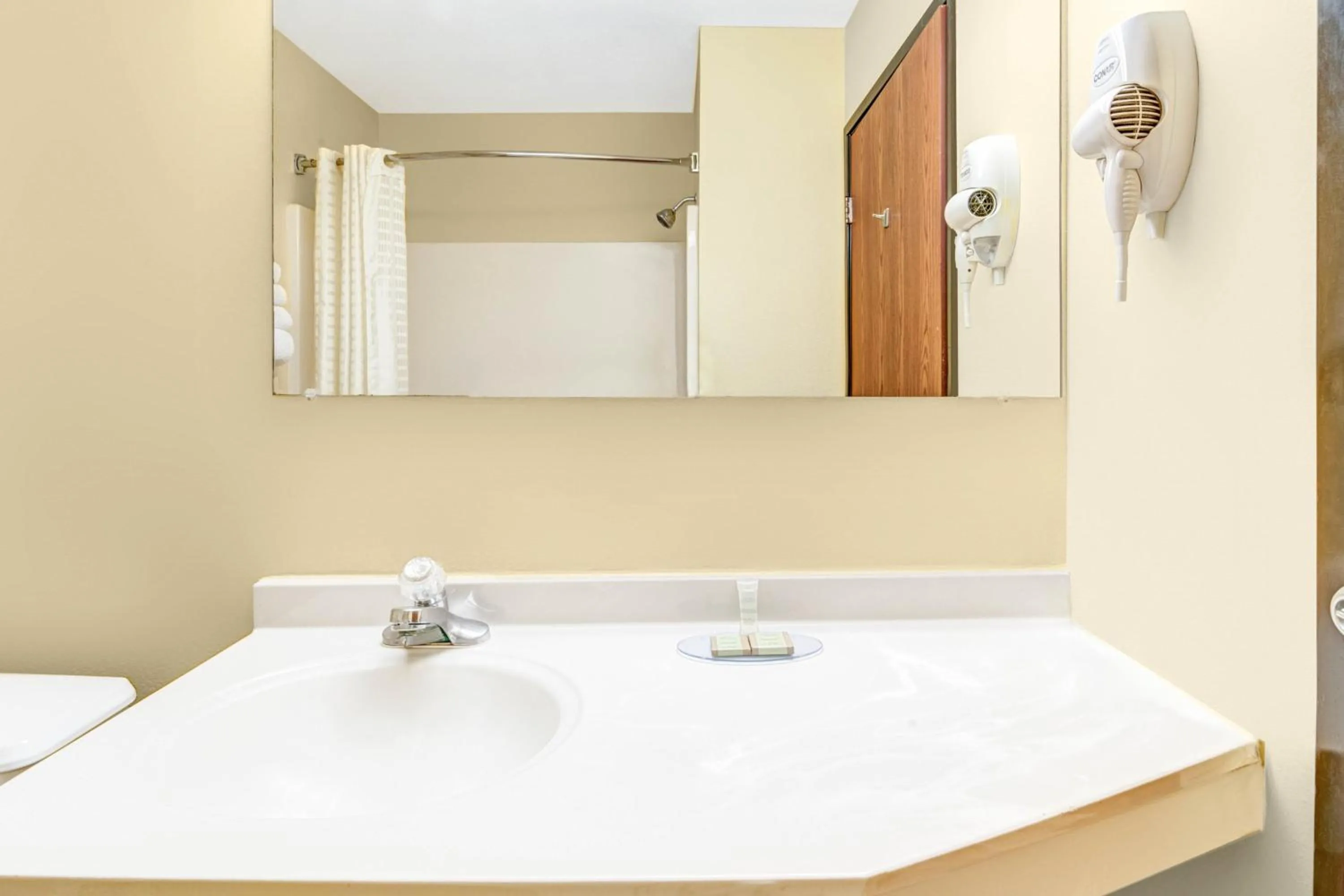 Bathroom in Super 8 by Wyndham McKinney/Plano Area