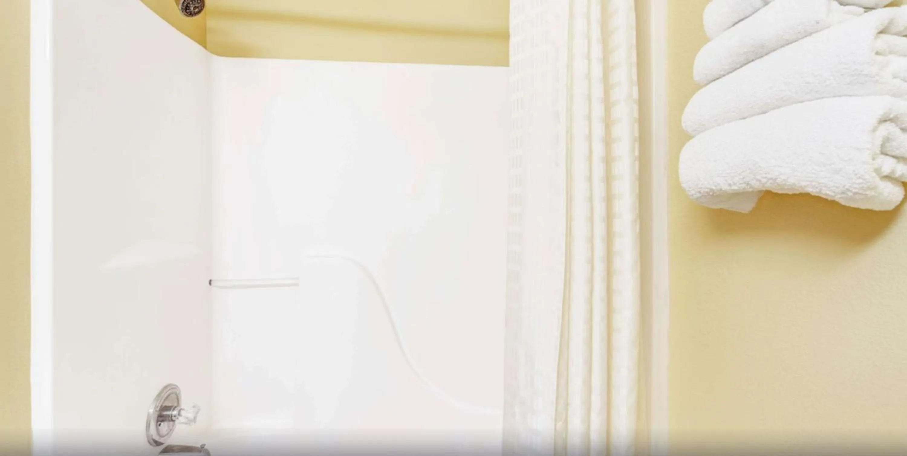 Shower in Super 8 by Wyndham McKinney/Plano Area