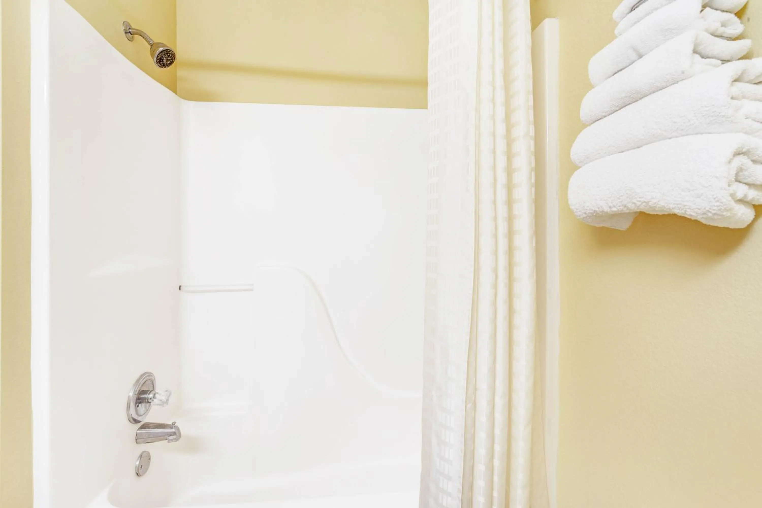 Shower in Super 8 by Wyndham McKinney/Plano Area