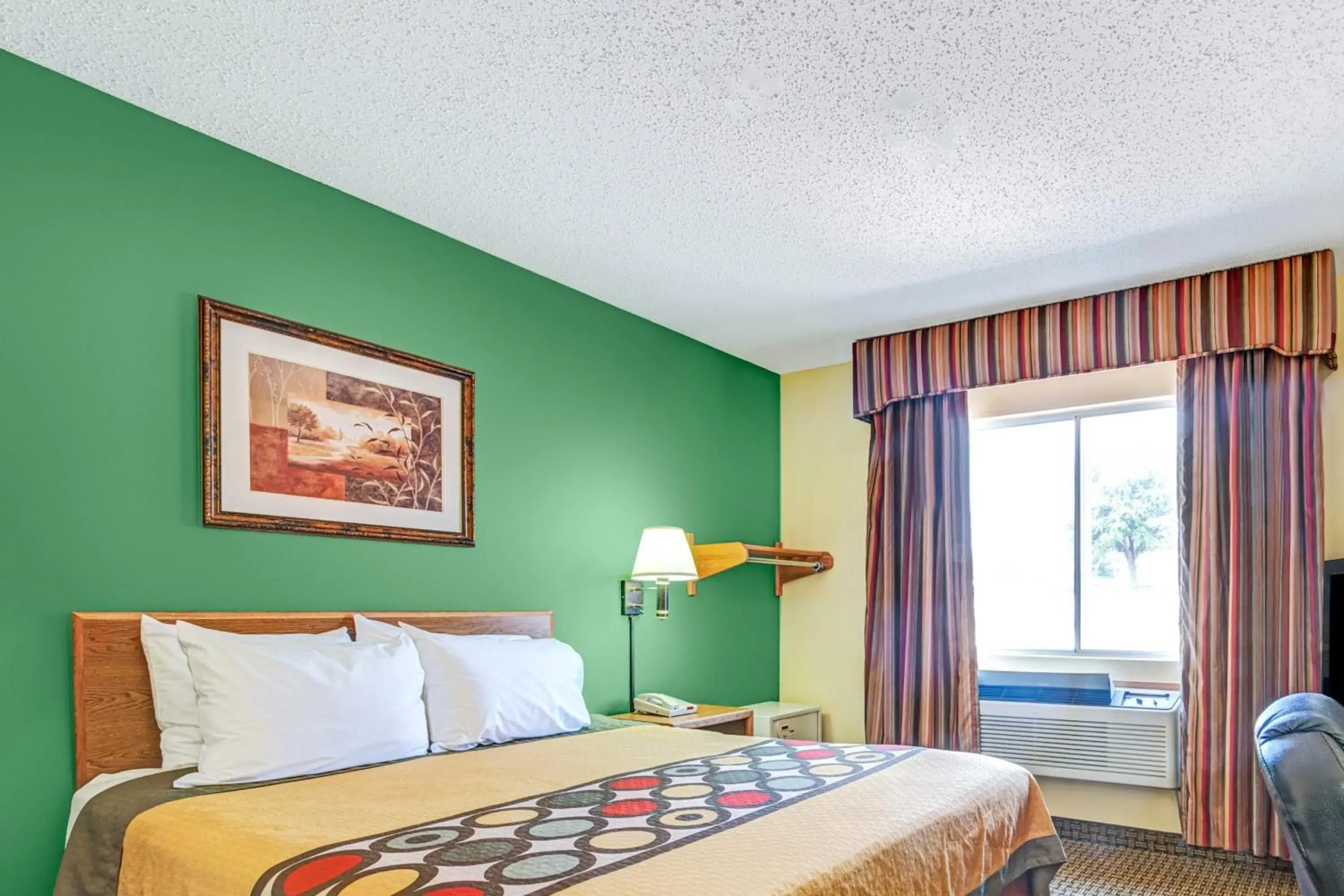 Bed in Super 8 by Wyndham McKinney/Plano Area Bed in Super 8 by Wyndham McKinney/Plano Area