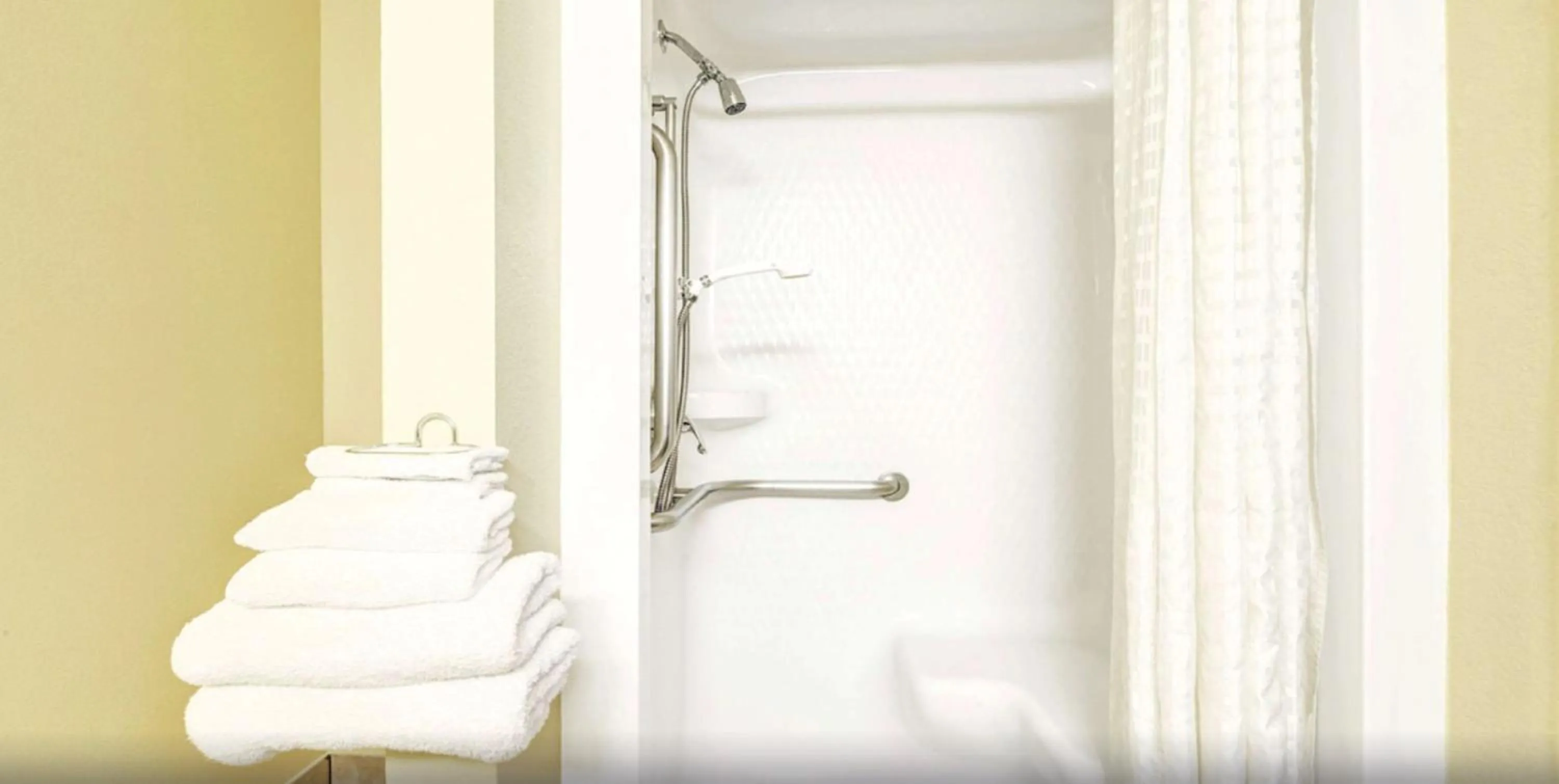 Shower in Super 8 by Wyndham McKinney/Plano Area