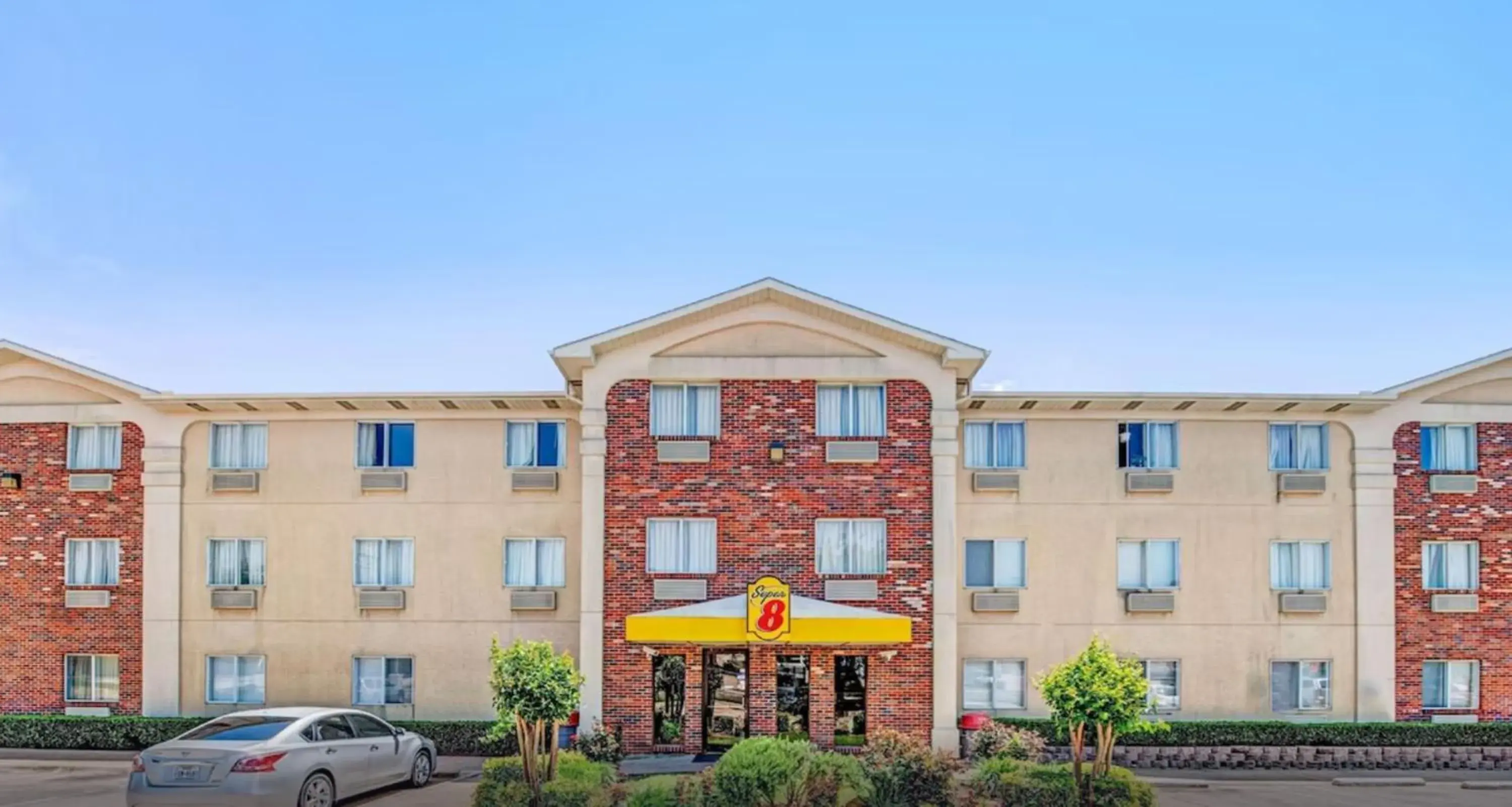 Property building in Super 8 by Wyndham McKinney/Plano Area Property building in Super 8 by Wyndham McKinney/Plano Area