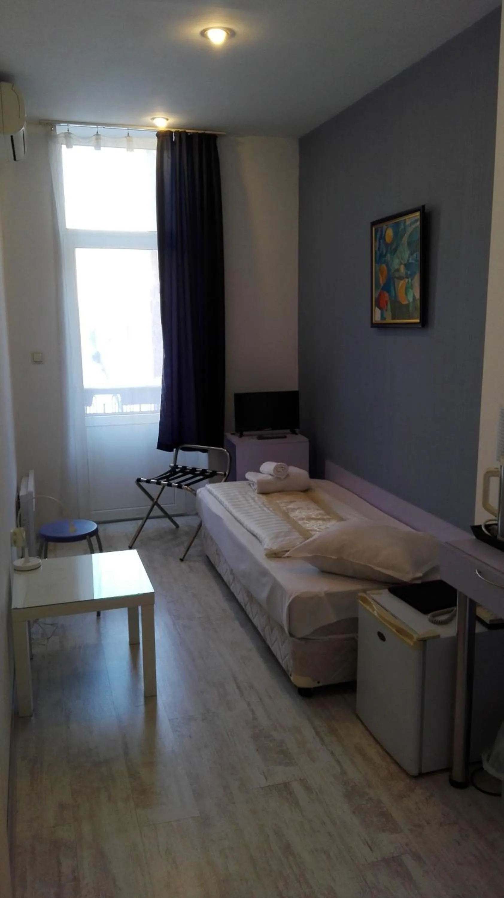 Bed in Scotty's Boutique Hotel