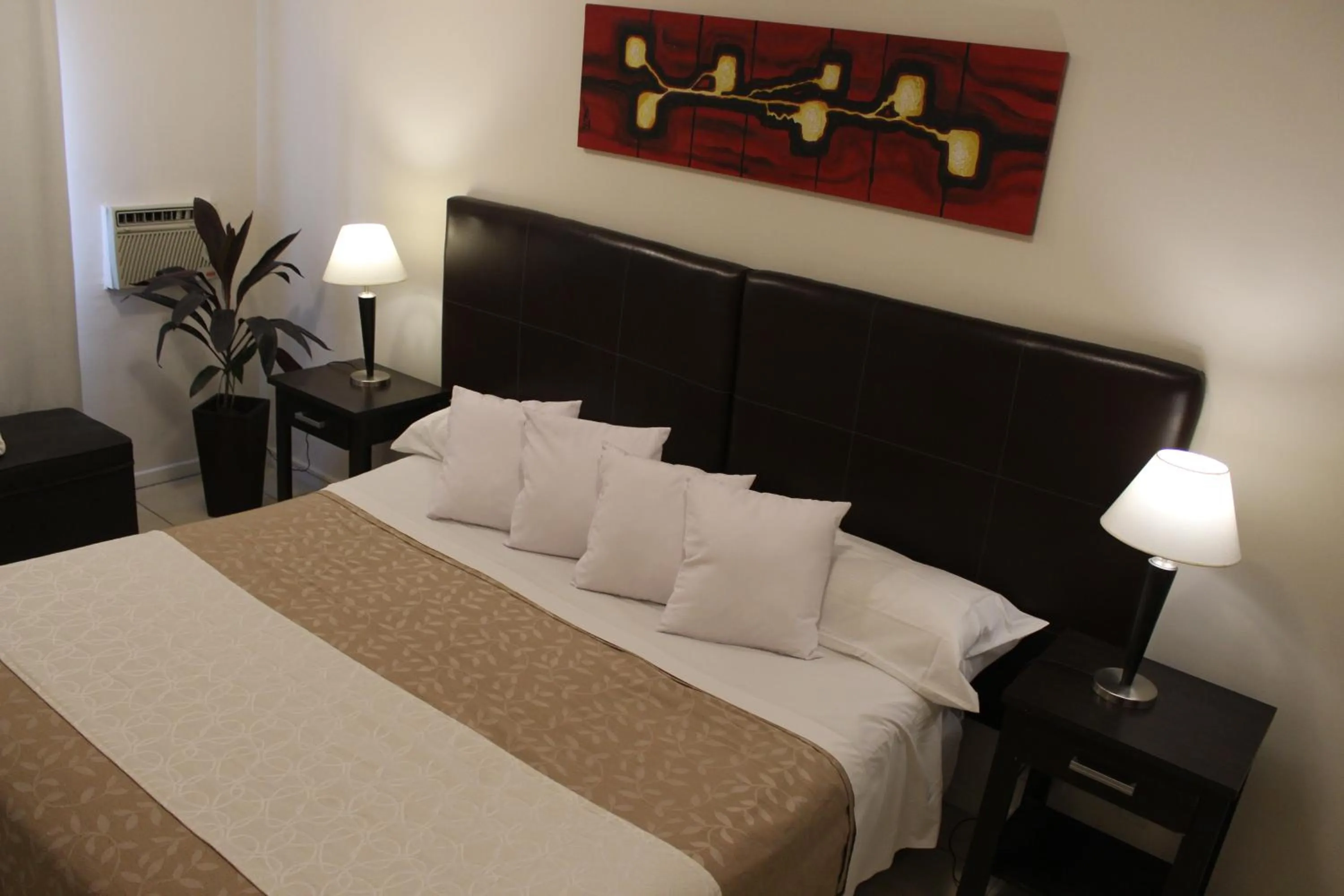 Bed in Uvas Apart Hotel