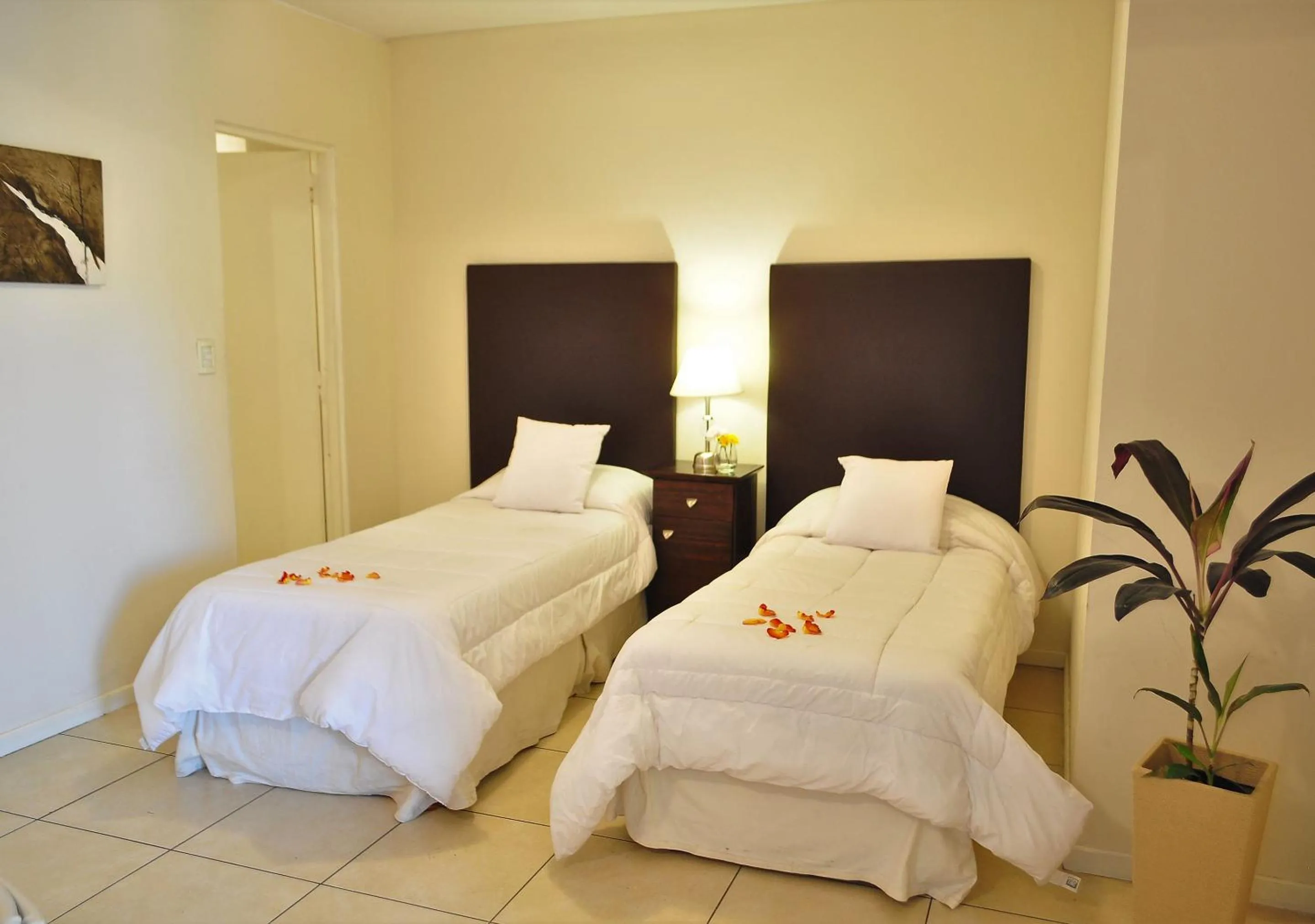 Bed in Uvas Apart Hotel