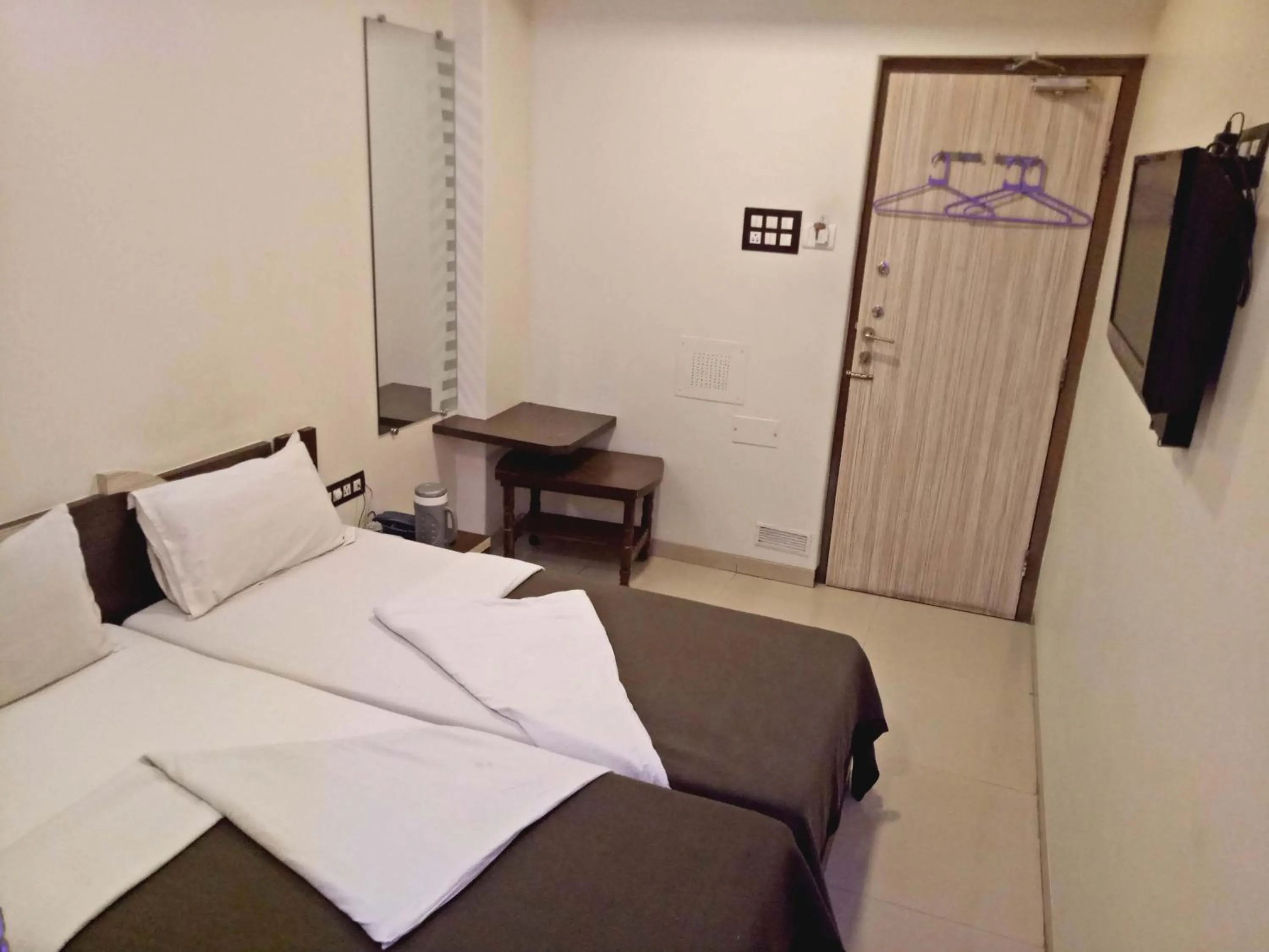 Bed in Hotel Navi Mumbai