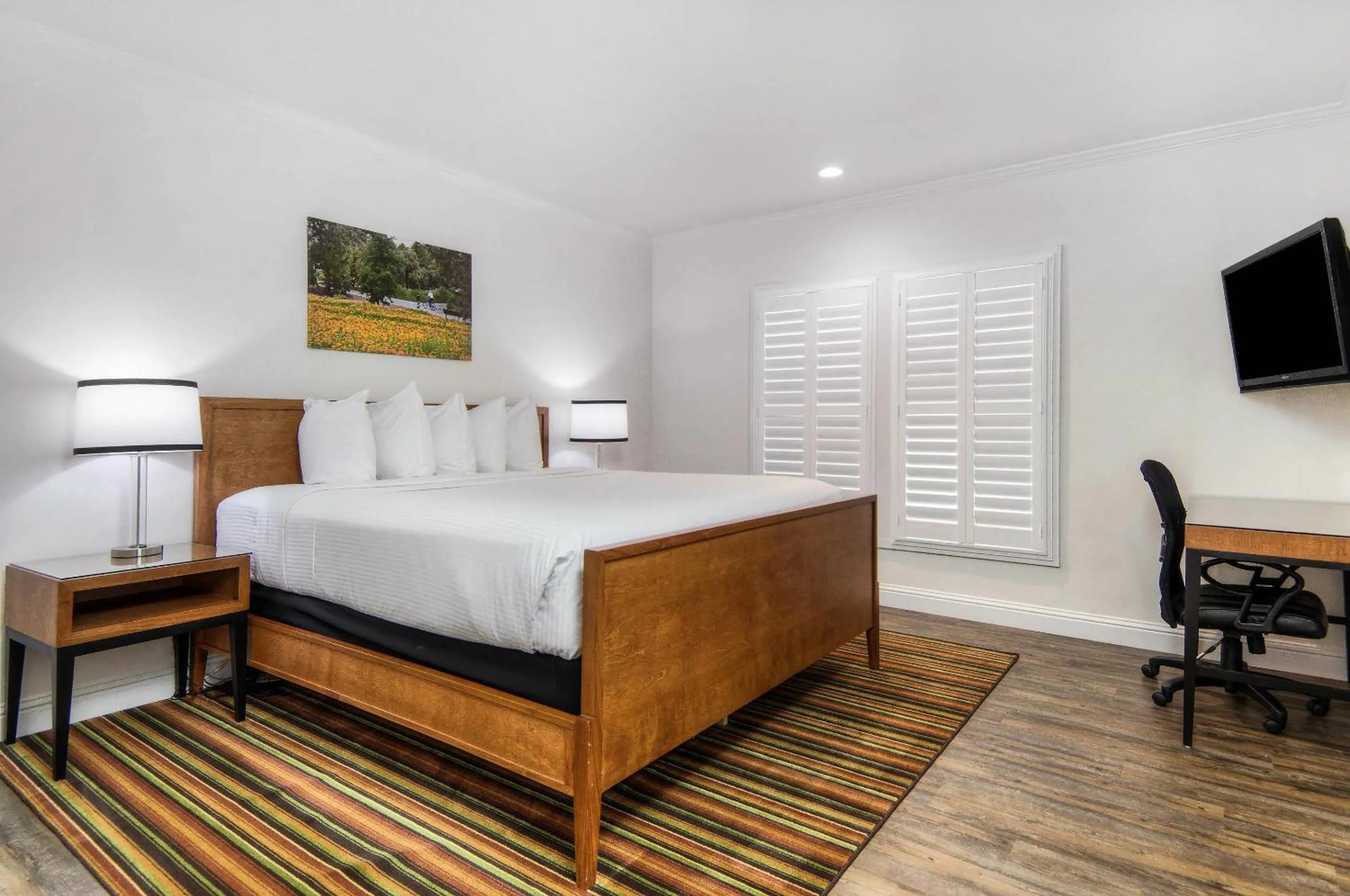 Bedroom, Bed in Aggie Inn, an Ascend Collection Hotel