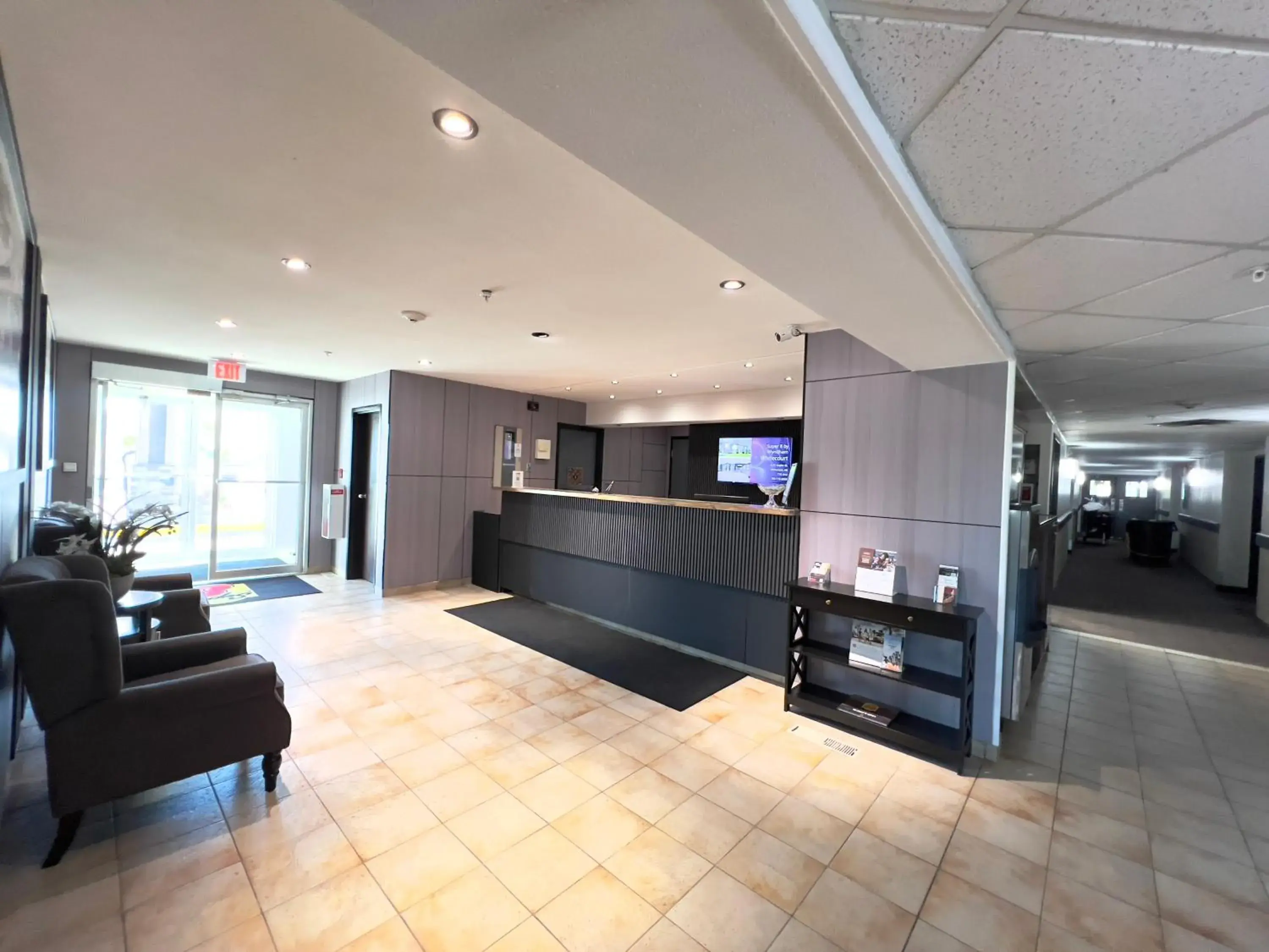 Lobby or reception in Super 8 by Wyndham Whitecourt Lobby or reception in Super 8 by Wyndham Whitecourt