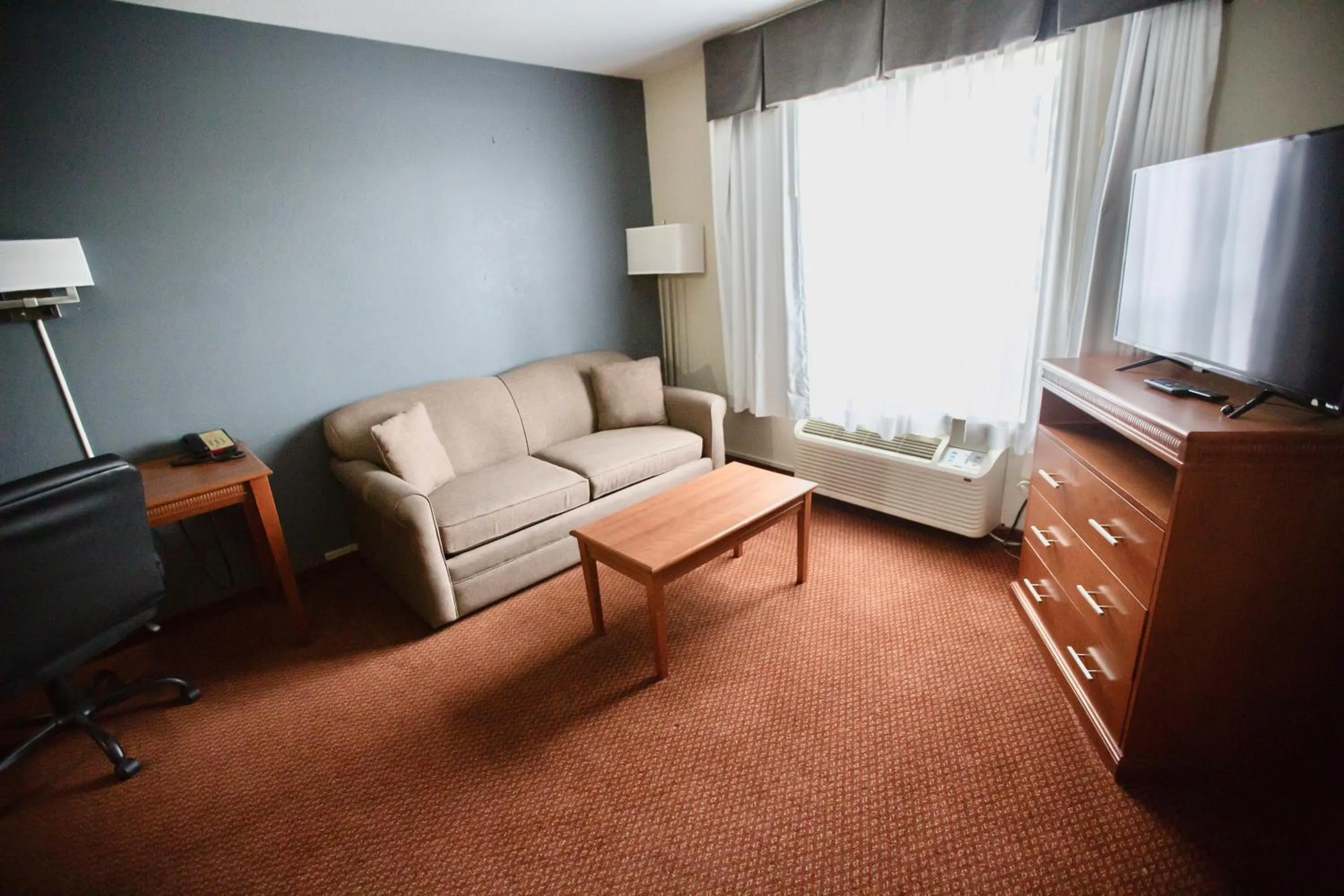 Seating area in Super 8 by Wyndham Whitecourt