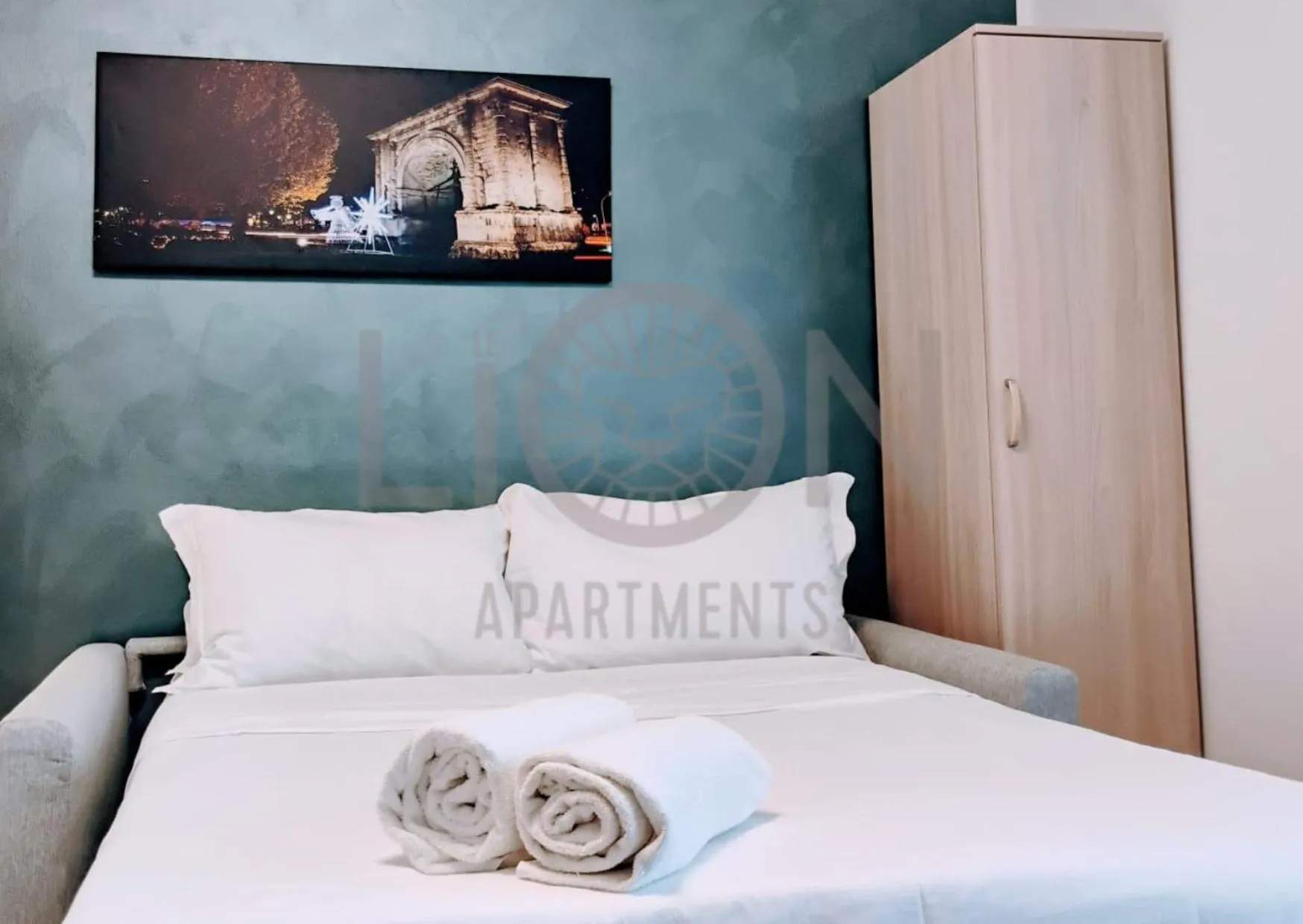 Bed in Le Lion Apartments - Lys Family Apartment