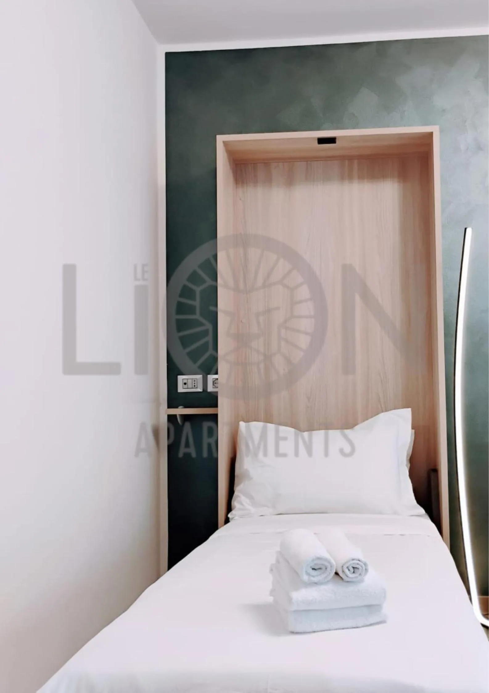 Bed in Le Lion Apartments - Lys Family Apartment
