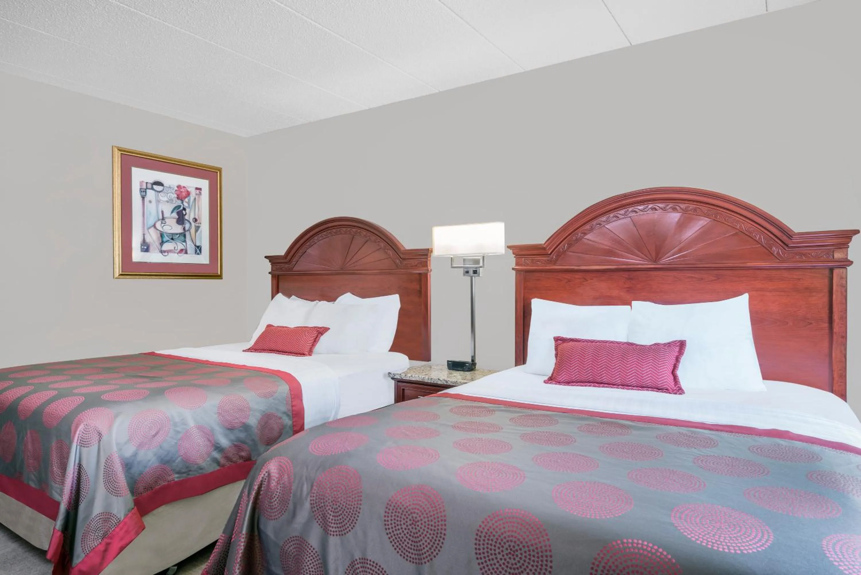 Decorative detail, Bed in Ramada by Wyndham Minneapolis Golden Valley