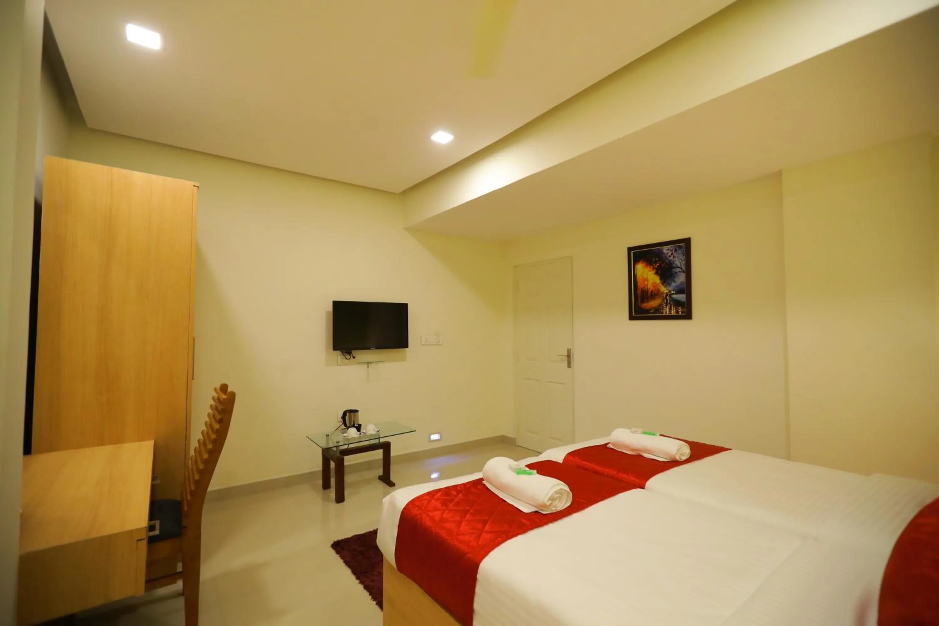 Bed in Prime Palace Hotel - MG Road