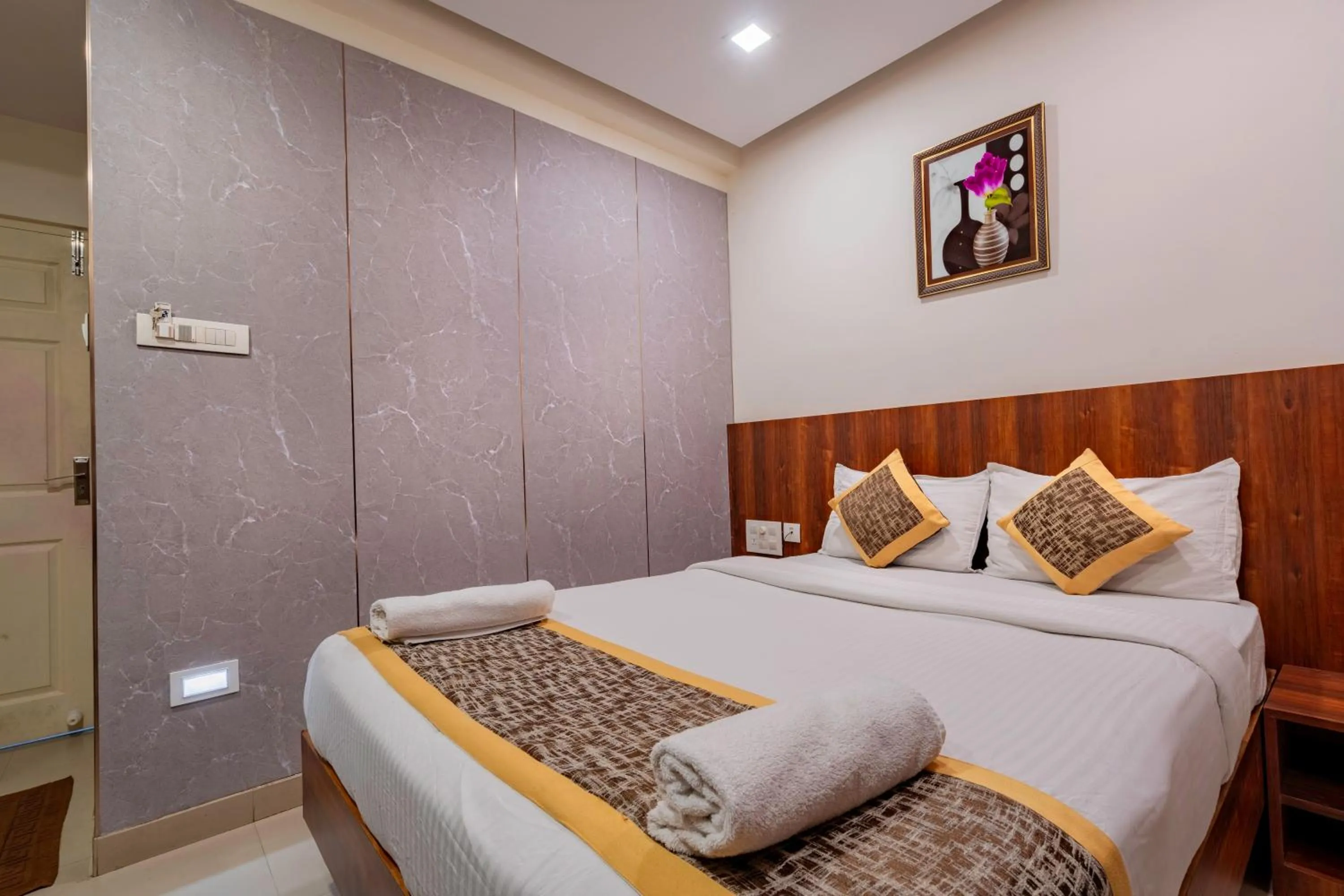 Bed in Prime Palace Hotel - MG Road