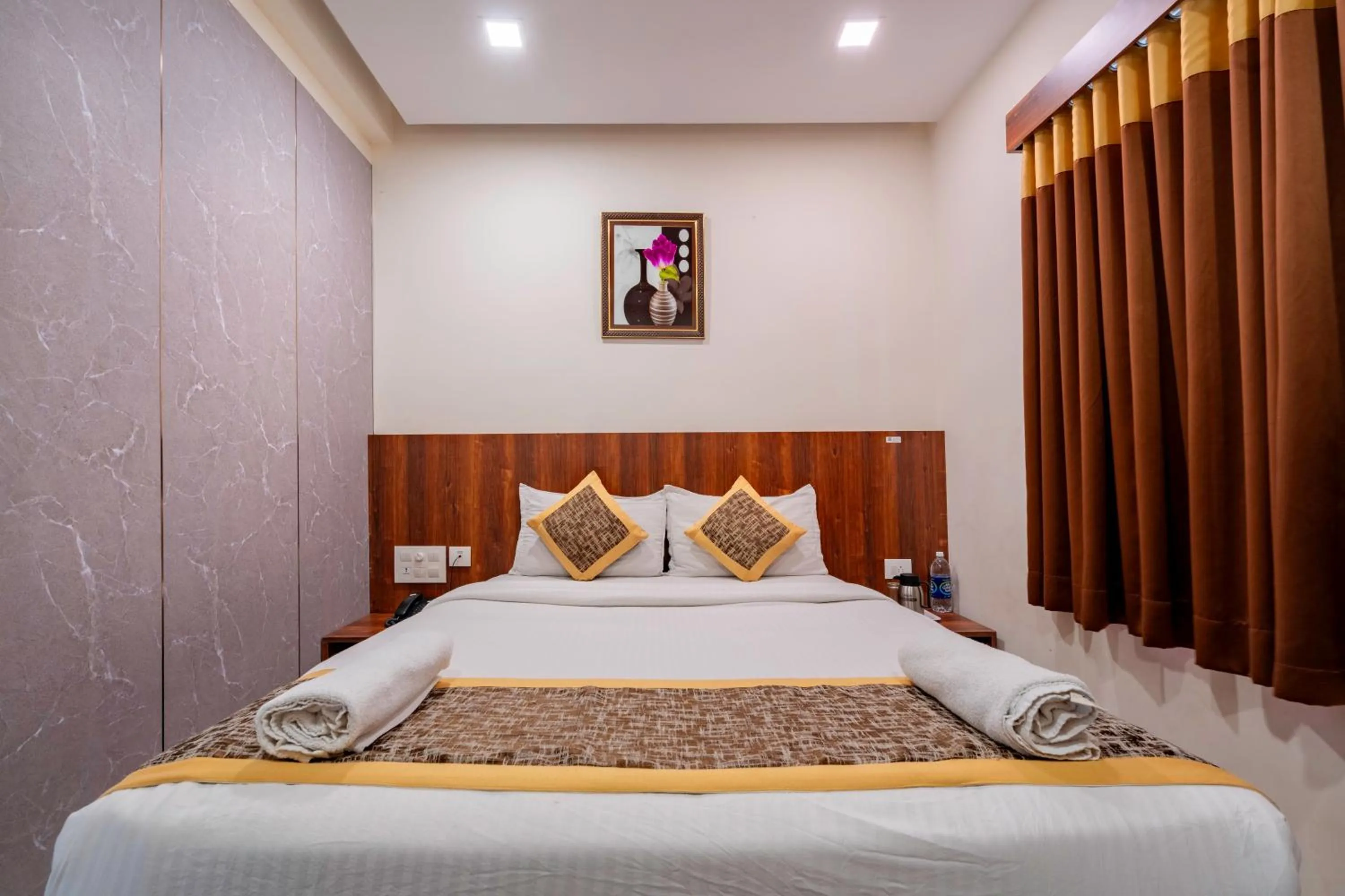 Bed in Prime Palace Hotel - MG Road