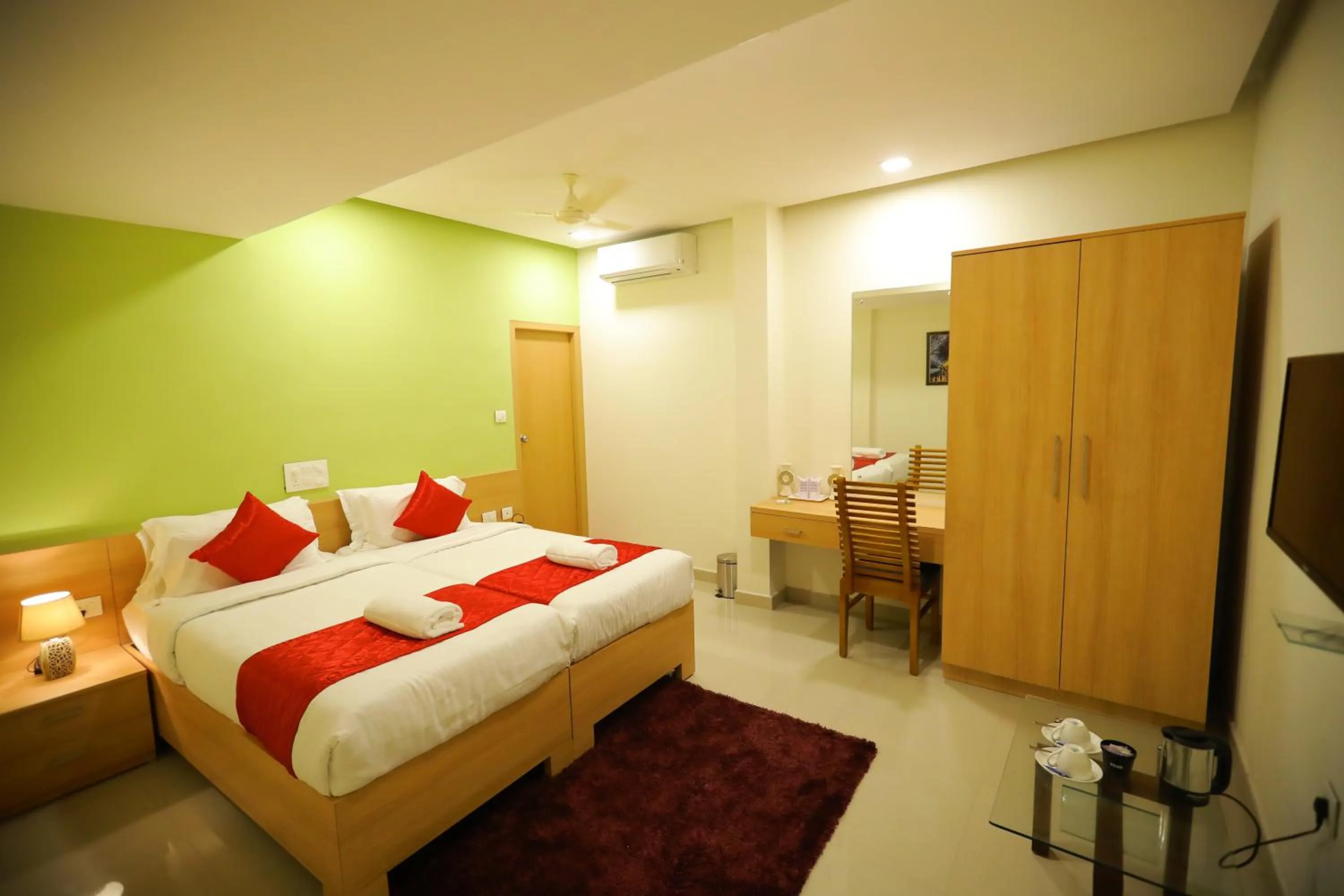 Bed in Prime Palace Hotel - MG Road