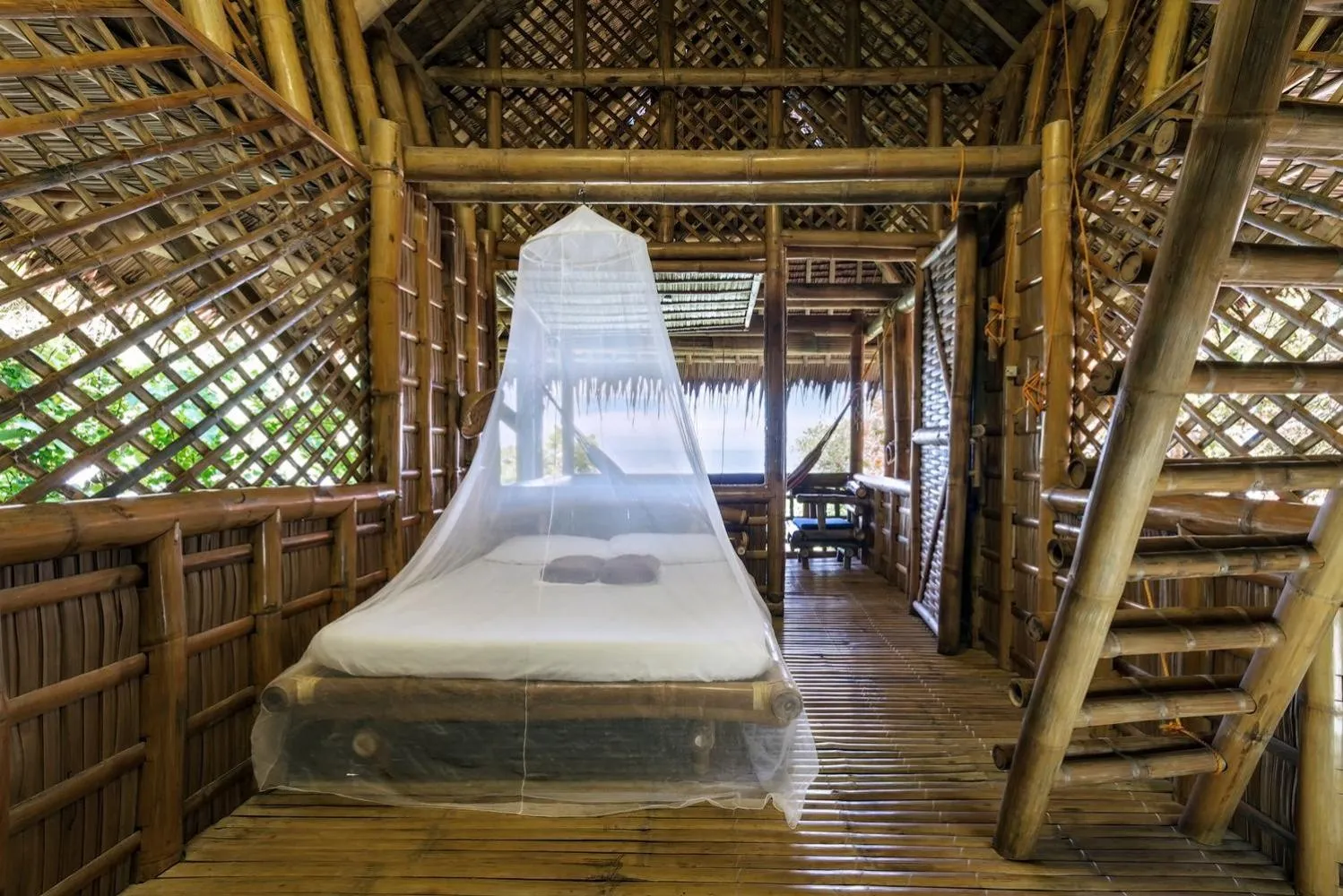 Bed in Kookoo's nest eco-lodge