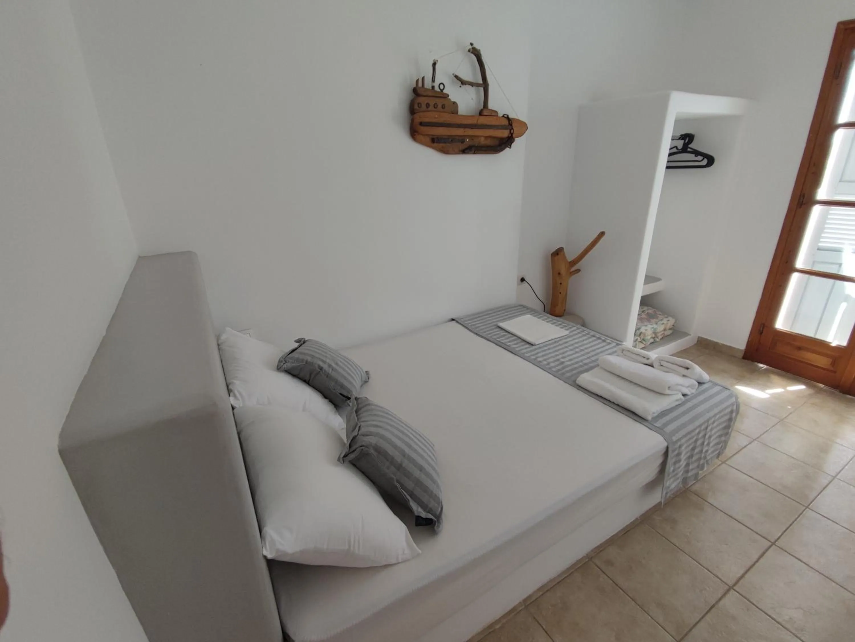 Bed in Agnanti Hotel