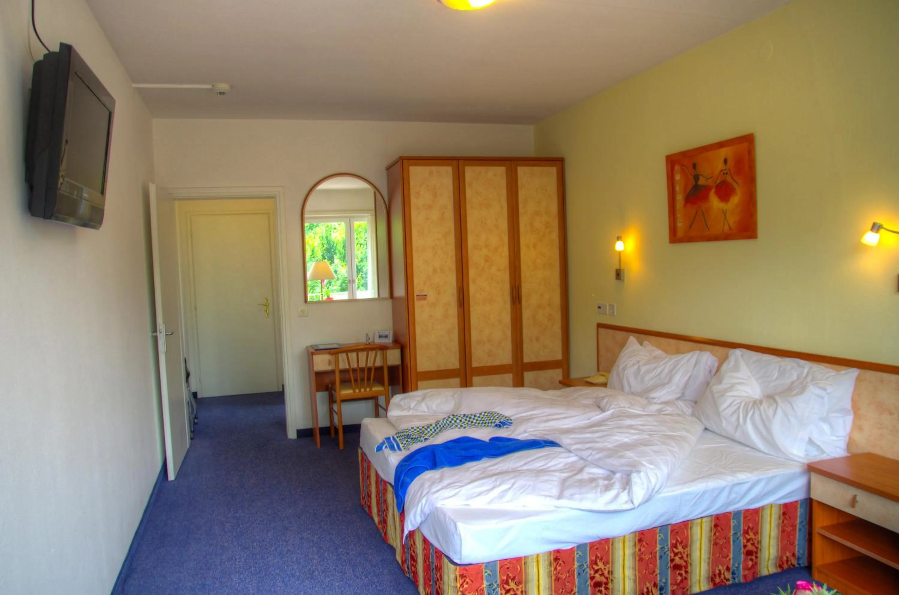 Bed in Hotel Excelsior