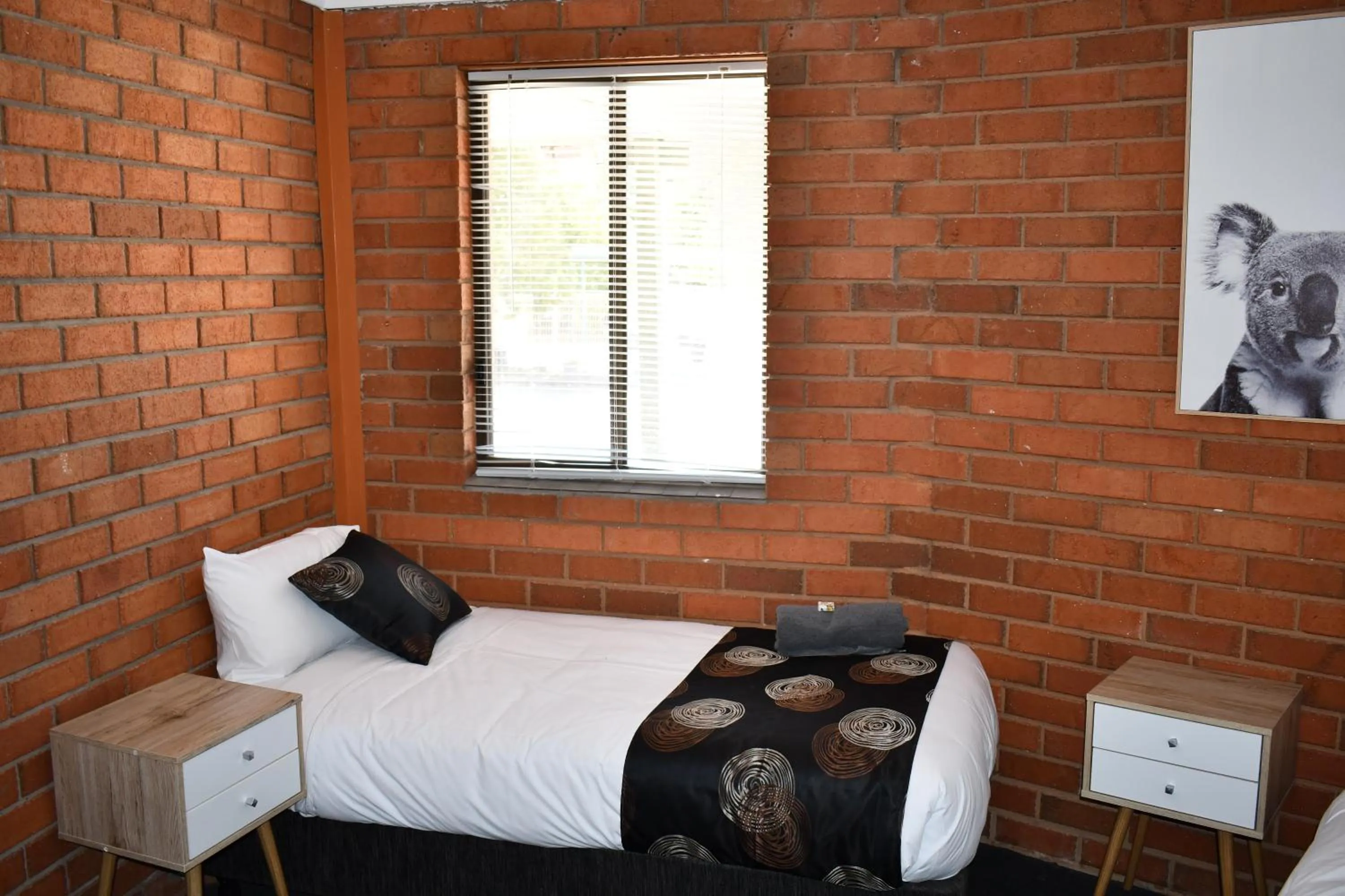 Bed in Berrigan Motel