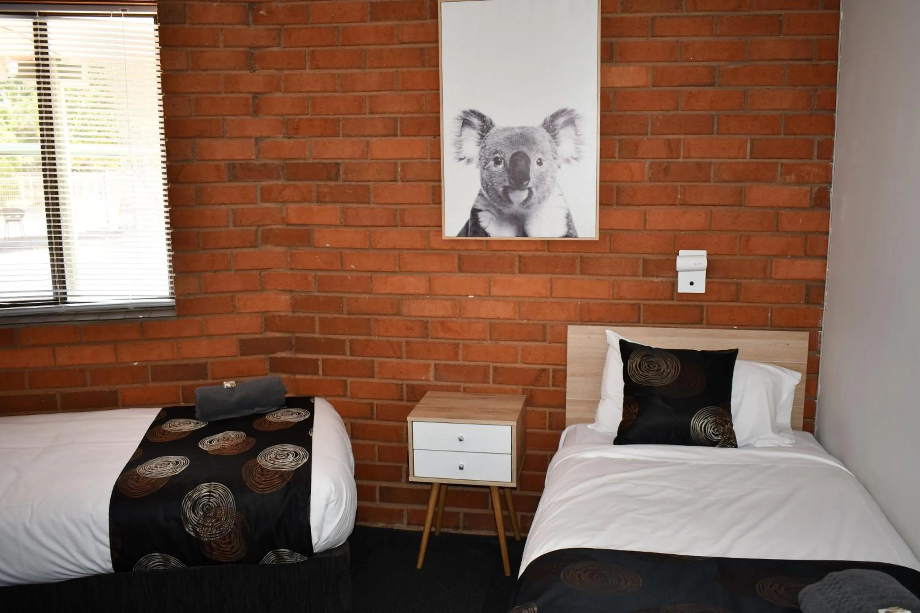 Bed in Berrigan Motel