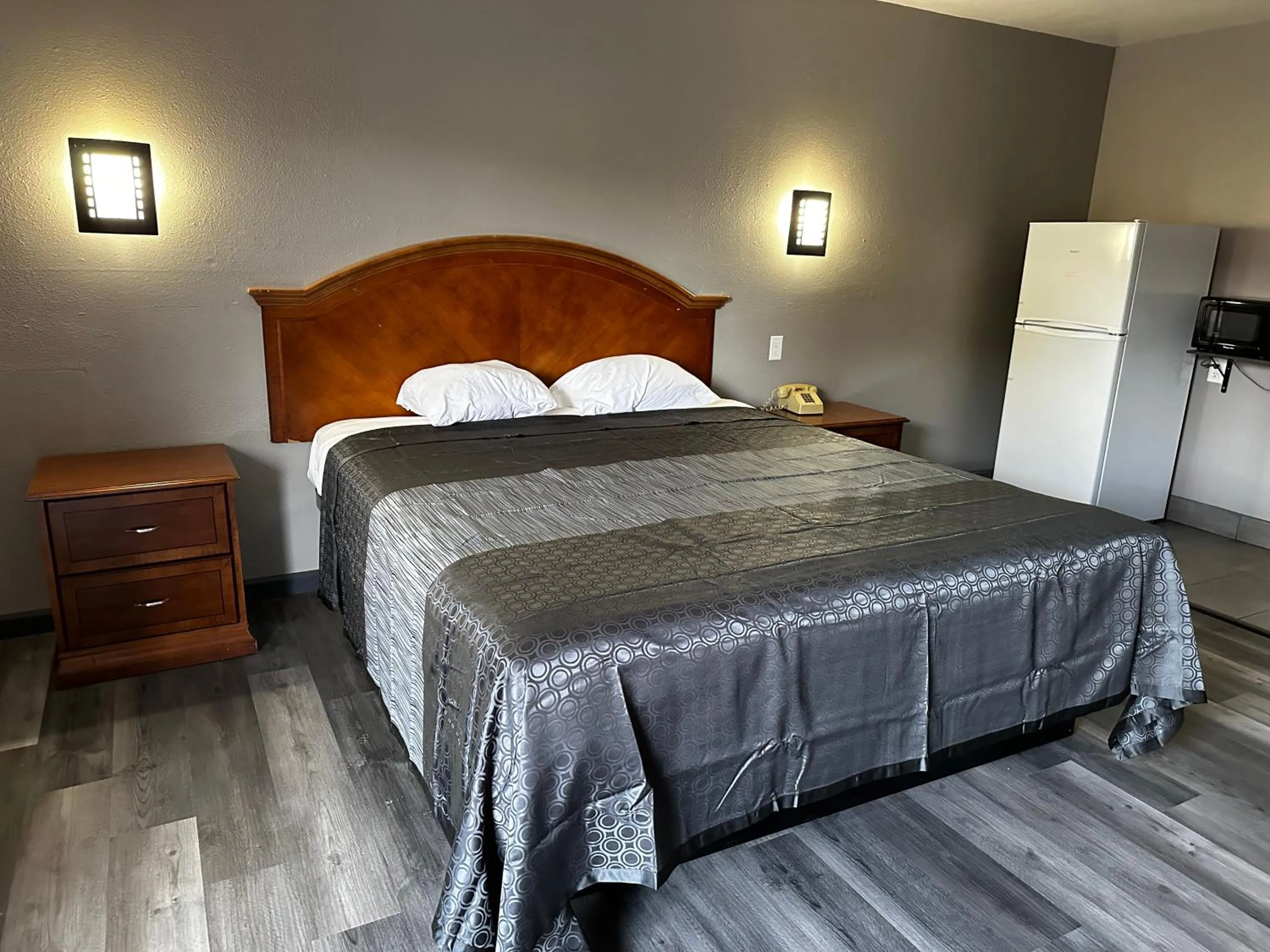 Bedroom, Bed in Sunpark Inn & Suites