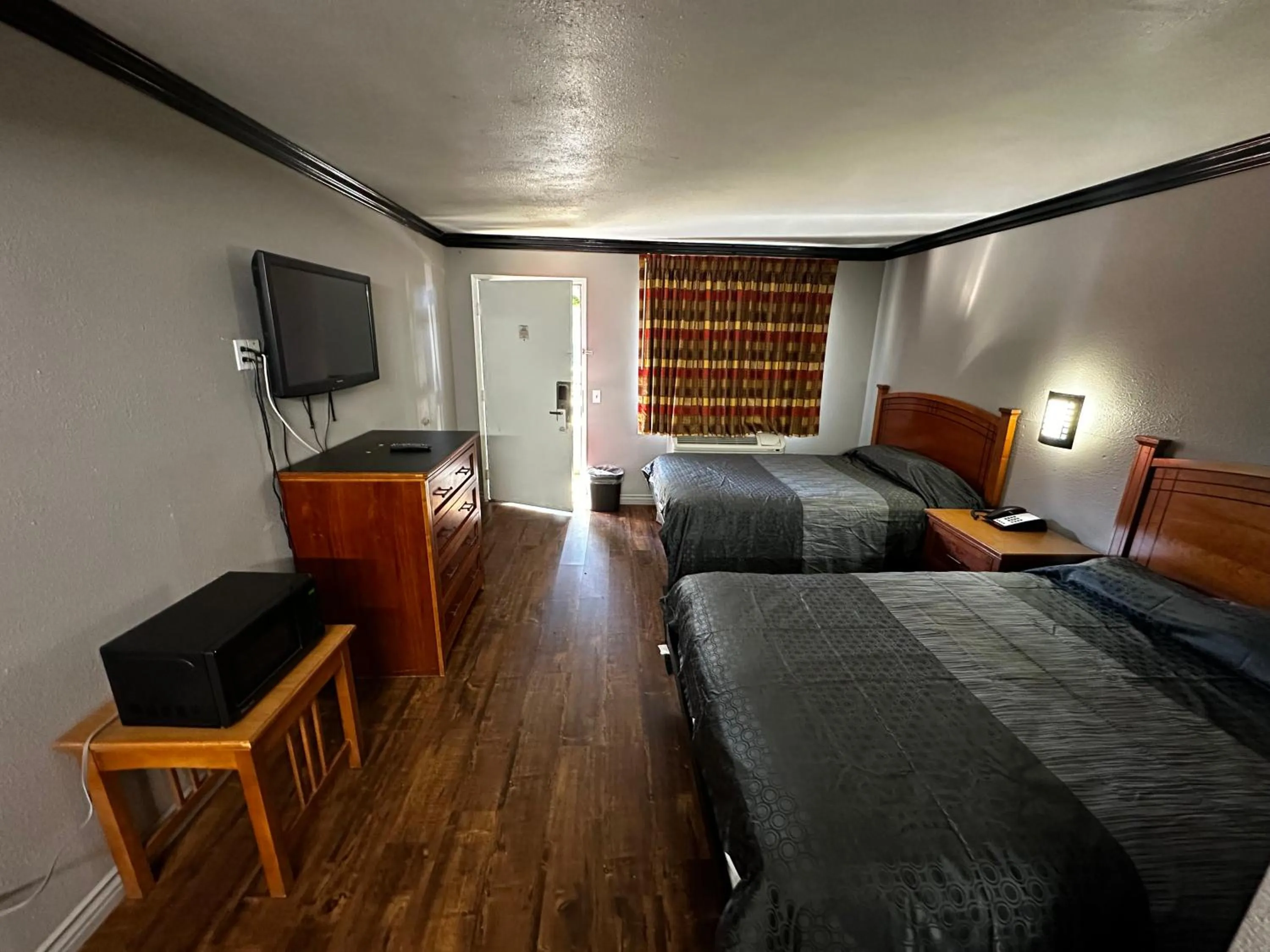 Photo of the whole room, Bed in Sunpark Inn & Suites
