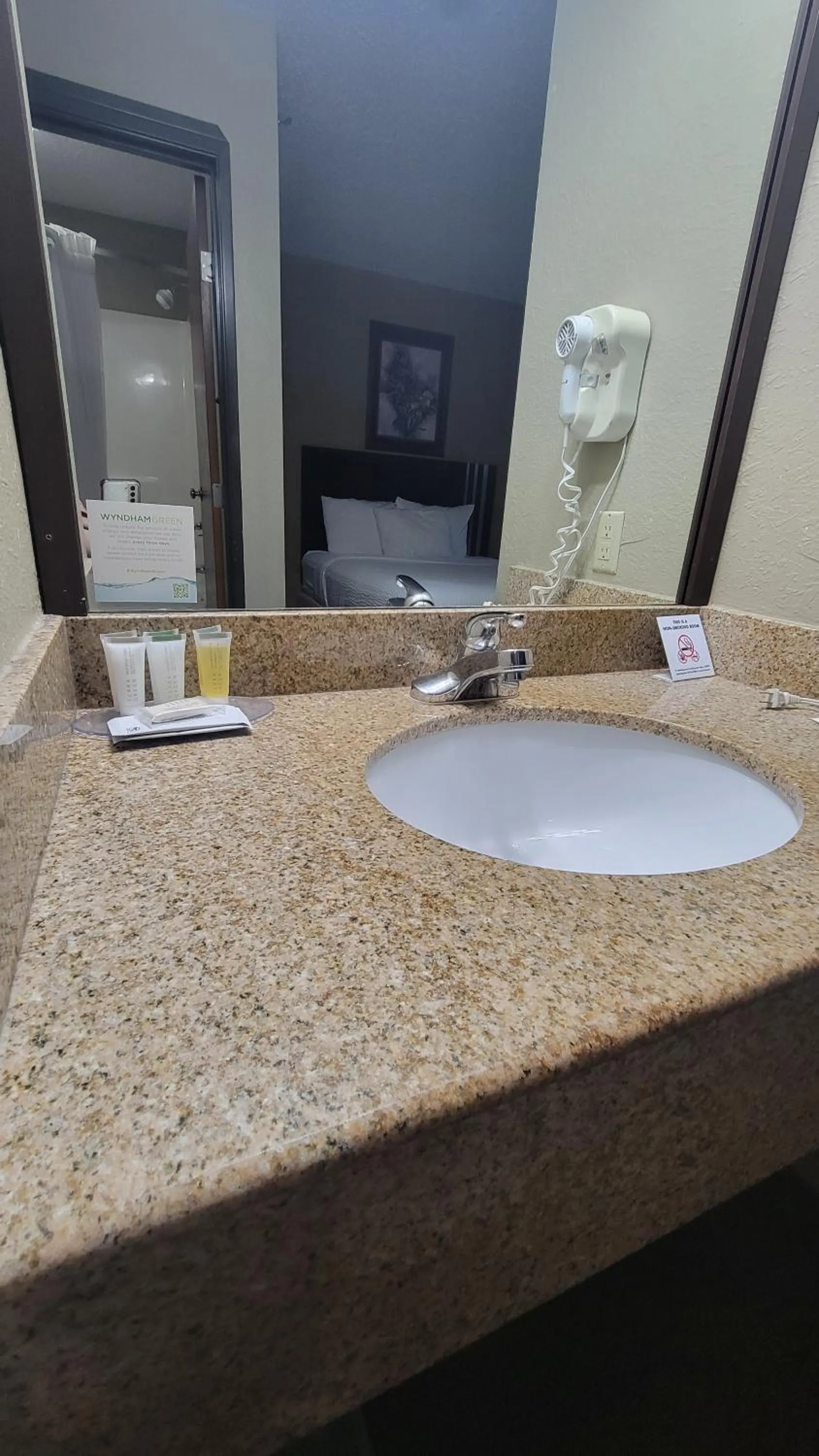 Bathroom in Days Inn by Wyndham Sheridan