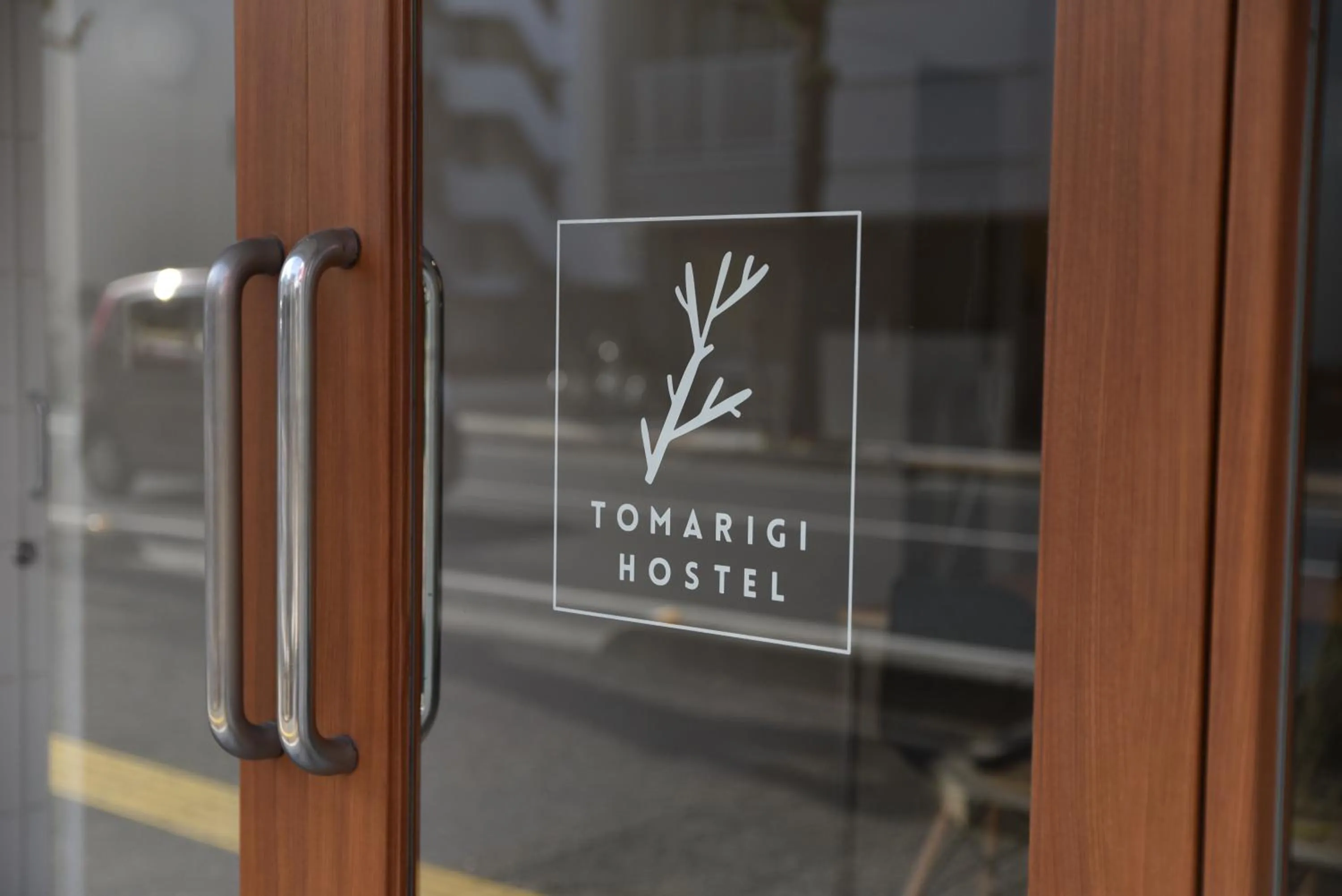 Property logo or sign in Tomarigi Hostel