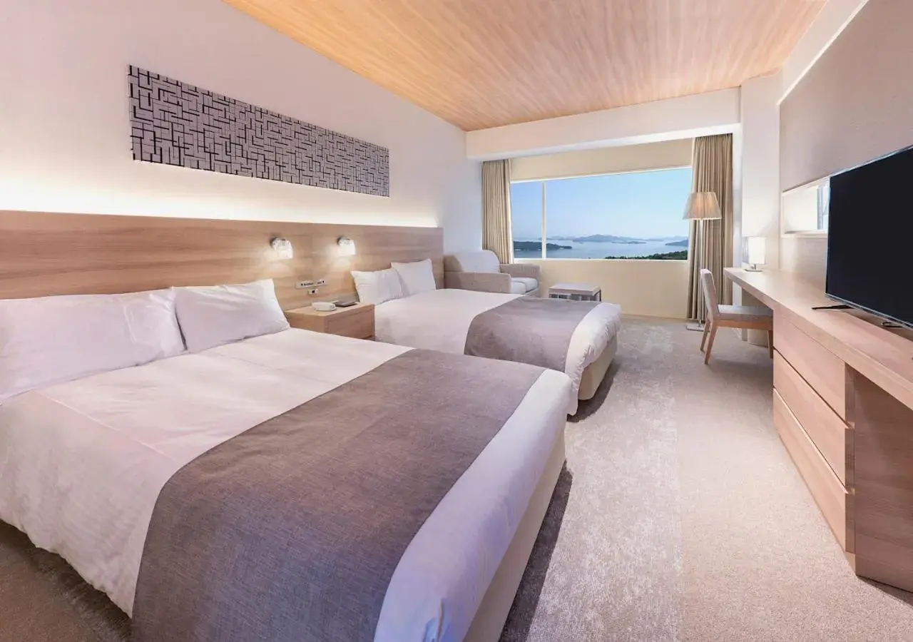 Bed in Setouchi Kojima Hotel Kurashiki Bed in Setouchi Kojima Hotel Kurashiki