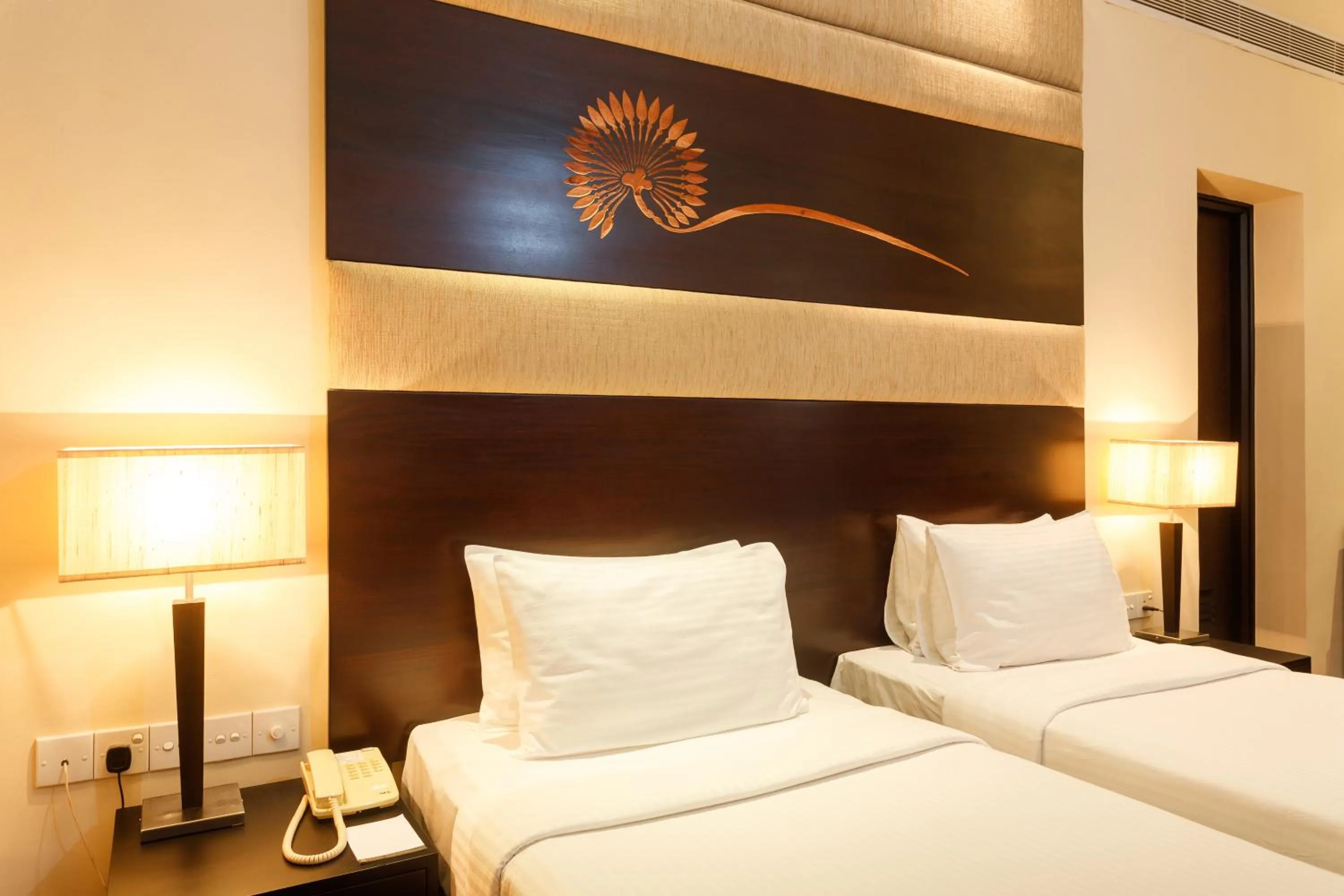 Bed in Renuka City Hotel