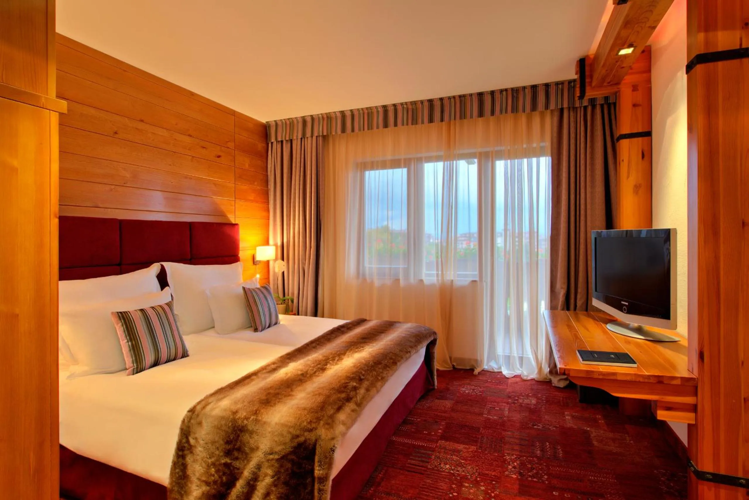 TV and multimedia, Bed in Kempinski Hotel Grand Arena Bansko