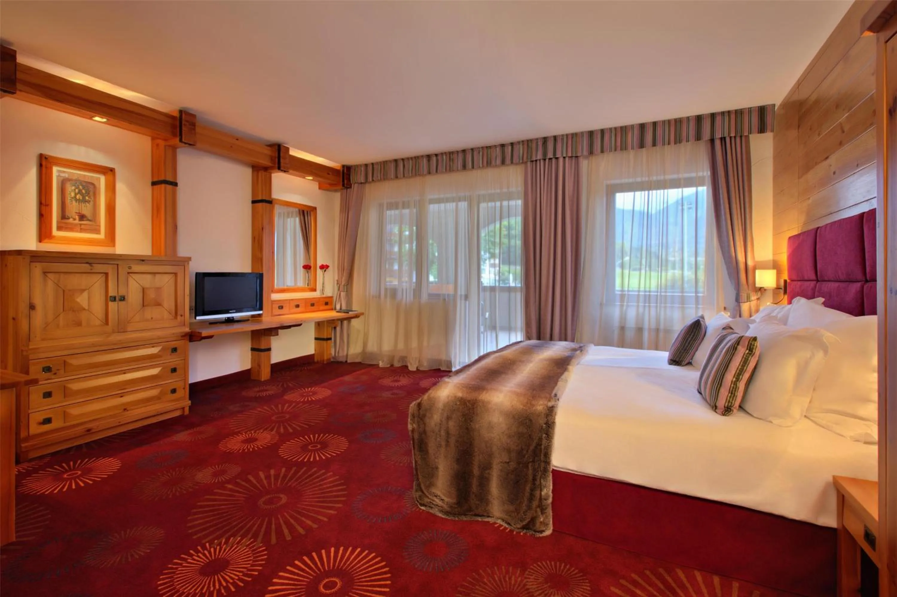 Photo of the whole room, Bed in Kempinski Hotel Grand Arena Bansko