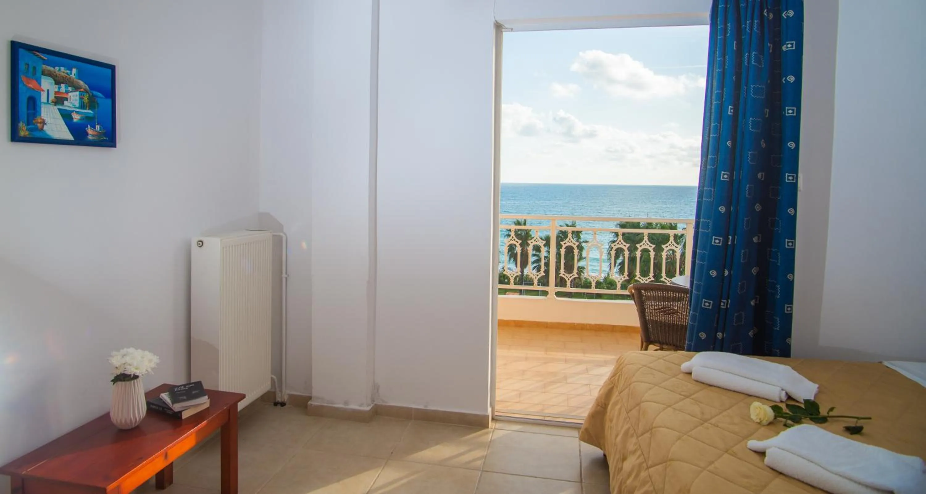 Bed in Poseidon Beach Hotel