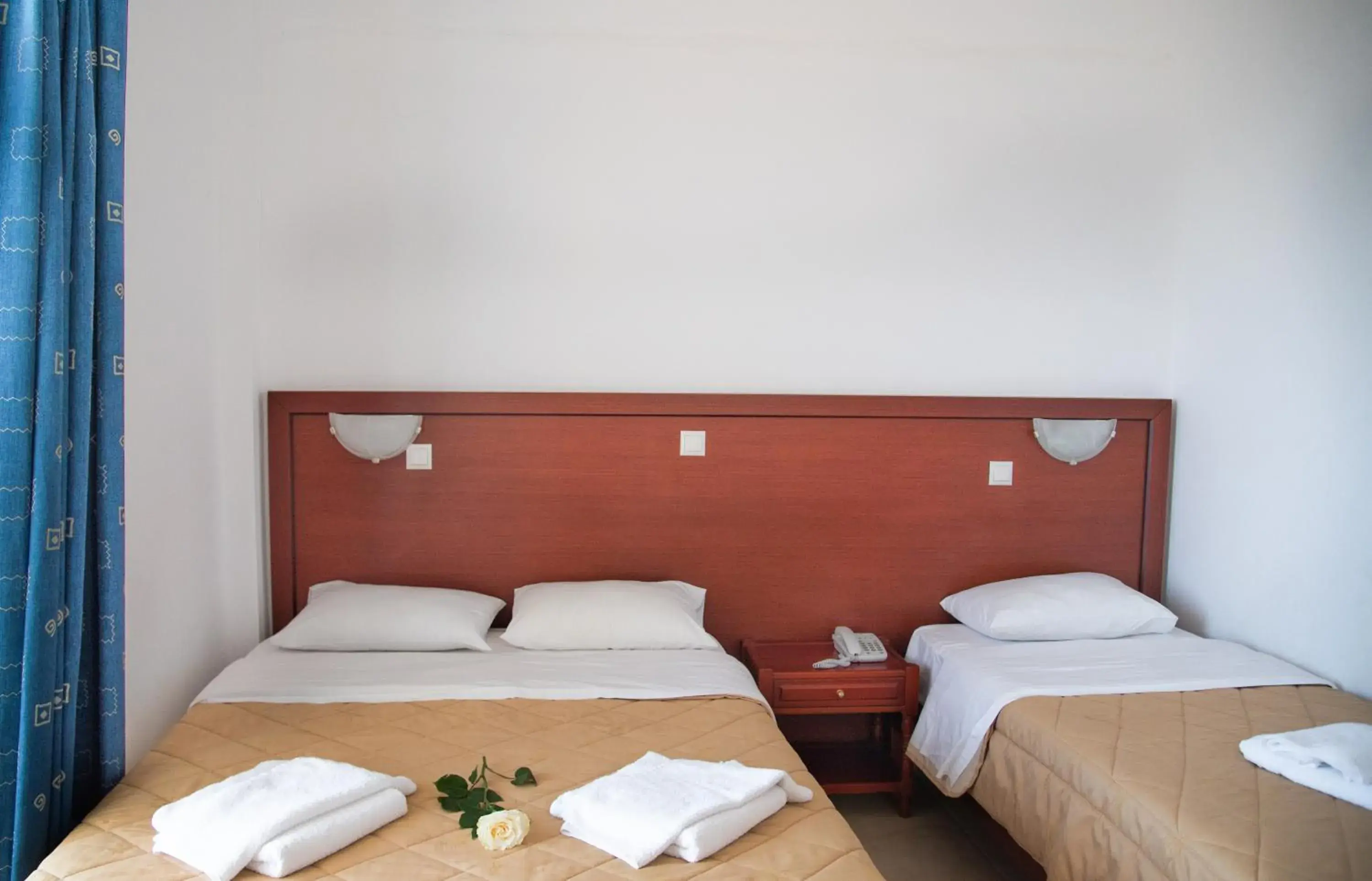 Triple Room with Mountain View in Poseidon Beach Hotel Triple Room with Mountain View in Poseidon Beach Hotel