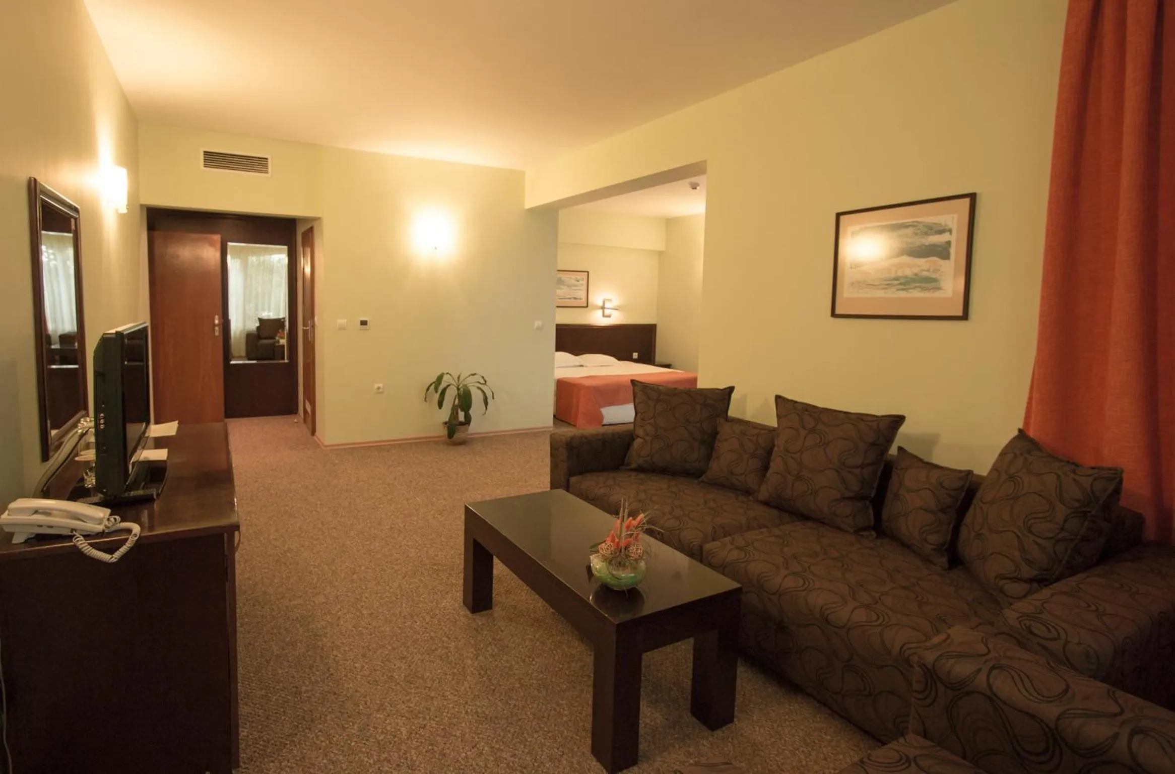 Seating area, Bed in Hotel Divesta - self check in